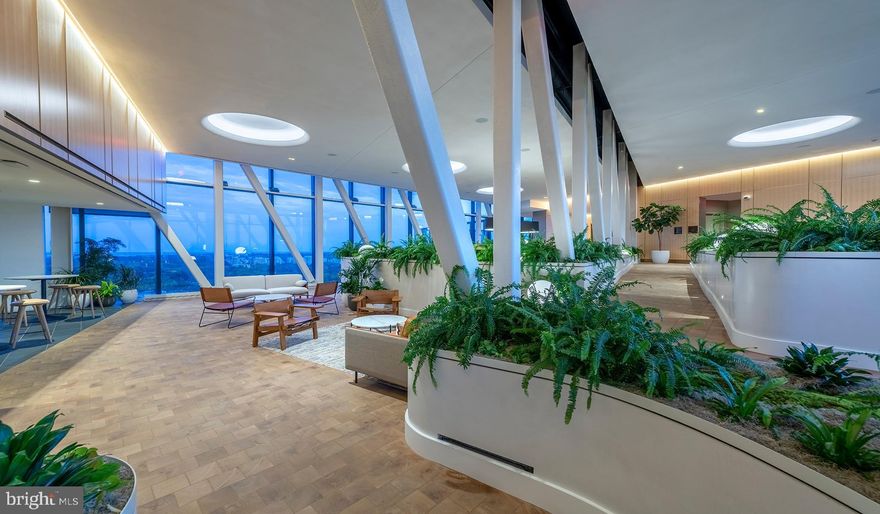 Experience the Pinnacle of Urban Living at The Elm, Bethesda

Nestled in the vibrant heart of Bethesda, adjacent to the bustling Bethesda Row, The Elm presents an exquisite blend of modern living and environmental consciousness, certified by its prestigious Gold LEED status. Our diverse range of homes, including studio, 1-, 2-, and 3-bedroom options, are meticulously designed with contemporary finishes, state-of-the-art stainless steel appliances, and an unparalleled location in the center of Bethesda.

Elevate Your Lifestyle with Exceptional Amenities. At The Elm, indulgence meets convenience. Soar to new heights of relaxation at our 28th-floor rooftop pool or embrace wellness at our modern fitness center. The 17th-floor landscaped terrace offers a serene escape, while our expansive Skybridge on the 28th floor provides a unique vantage point. Our community spaces, including lounge areas and workspaces, cater to your every need, mere steps from a plethora of dining and retail options.

Discover Unparalleled Living Spaces. Our homes and penthouses boast double-height ceilings, bathing each space in natural light. Revel in the luxury of walk-in closets and modern kitchens equipped with Bosch and Samsung appliances. Select homes further enhance your living experience with private balconies and patios.

Immerse Yourself in the Cultural Hub of Bethesda Row. Reside in the epicenter of culture, dining, arts, and entertainment. The Elm is a stone's throw away from Woodmont Triangle, a vibrant nexus of cultural activities and community events. Enjoy an array of outdoor concerts, art festivals, and farmer's markets that animate the neighborhood year-round.

Redefine Relaxation and Productivity. Our rooftop pool is not just a swimming facility; it's an oasis of tranquility with resort-style seating and stunning panoramic views. The Elm's numerous spaces are designed for your relaxation, health, and convenience, offering a myriad of ways to unwind and rejuvenate.

Your Personal Sanctuary and Community Awaits. Whether you're immersing yourself in a captivating novel or engaging in meaningful conversations, The Elm offers the perfect backdrop. Our curated fitness studio caters to health enthusiasts with a convenient and inspiring workout environment. The 28th-floor Skybridge is an ideal spot for hosting events or enjoying private gatherings, all while being surrounded by breathtaking views.

Schedule Your Personalized Tour Today. We are dedicated to providing an exceptional living experience. Contact us to schedule a tour tailored to your preferences. The Elm is proud to be a smoke-free and pet-friendly community. Welcome to a new standard of living, where every detail is crafted for your comfort and convenience.

** Pricing and availability subject to change on a daily basis ** Photos are of model units ** Parking may be available for an additional fee **