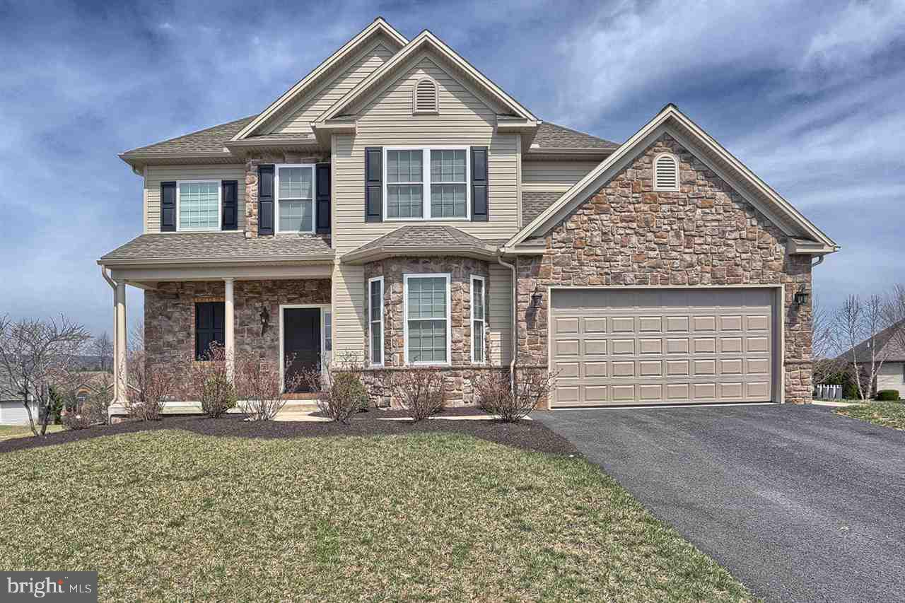 Enjoy the maintenance free lifestyle in this beautiful Tiday Built home with all of the features that you are accustomed to seeing from this builder.  Featuring a 1st floor master suite w/ his & her walk-in closets, a luxury master bath & a timeless kitchen which gracefully opens to the 2 story family room w/ gas fireplace & multiple windows. These are just some of the lovely features that this home has to offer!