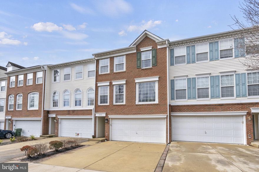 ***Offer deadline has beeen set for Monday, Feb. 19th at 12:00 p.m. *** Welcome to this 3-level townhome in Riverside Station, offering 3 bedrooms, 2.5 baths and an open concept floor plan. The kitchen has 42" cabinets, granite countertops, gas stove, and a beautiful backsplash. A large oversized living area with plenty of space for a big screen TV.  Vaulted ceilings in the primary suite along with a large soaking tub and separate shower, creating a welcome haven for rest and relaxation.  Washer and dryer are on the bedroom level.  The deck off the main level backs to trees and is made from Brazilian hardwood. Stairs off the deck lead to a paver patio with plenty of room for gardening. HVAC was replaced in 2020.  Roof was replaced in 2019.  This home has a two car garage and is in walking distance to the VRE.