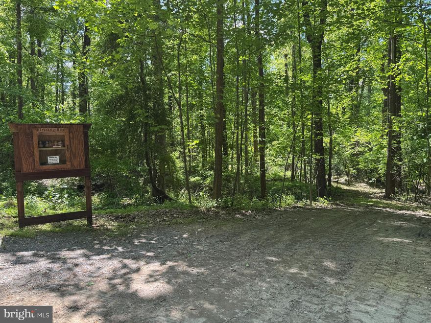 Three adjoining lots (#31, #32, and #33) totaling approximately 0.36 acres, plus an additional lot (#13) of approximately 0.14 acres, located in the desirable Westridge Hills Subdivision in Harpers Ferry. Enjoy peace and quiet on these wooded lots, nestled in a serene mountain setting that offers both privacy and natural beauty. While tucked away, the property remains conveniently located near commuter routes and local amenities. A “Blessing Box” currently located at the front of the lots will be removed prior to settlement. Enjoy close proximity to the Appalachian Trail with access just a 5-minute walk away. Westridge Hills also offers a community fishing pond and a playground, making it a great setting for families with children.
Legal Description: 
SEC E #13 WESTRIDGE HILLS
SEC D #33 WESTRIDGE HILLS
SEC D #32 WESTRIDGE HILLS
SEC D #31 WESTRIDGE HILLS
Buyers are responsible for conducting their own due diligence regarding the intended use of the property. The seller makes no representations or warranties as to the use, zoning, or development potential. The seller believes the property is connected to public water; however, buyers should independently verify all utility information to their satisfaction. Buyer shall obtain a title search as part of their due diligence.