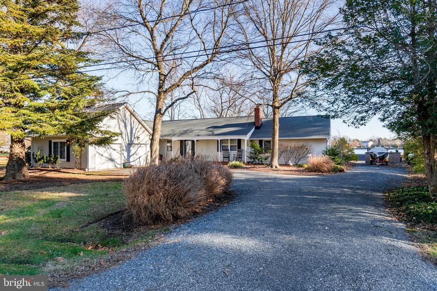 Back on the market.  through no fault of the property.  Their loss is your gain.  
Bring yur boat!  Or just your chairs to watch the sunrise over the water.  Your own private  oasis.  This home was extensively remodeled by the previous owner, with the current owner  making their own perfect  upgrades.  This includes a new primary suite with luxurious   custom primary bath and California Closet walk in closet.   The extraordinary primary suite overlooks the extensively  hardscaped patio and  back yard oasis  on Spencer Creek.  The perfect outdoor space for entertaining and relaxation -your delightful  getaway.  Leading  to a new dock and floating dock with kayak launch.  New laundry room, new 50 year roof and HVAC,  they also upgraded the lighting and refinished the  hardwood flooring. This is your dream home with a spacious eat in kitchen,  dining room, sunroom and  living room with fireplace.  There are three additional bedrooms and two other full baths for plenty of company.  One of the bedrooms has a private bath. There is an oversized two car garage with stand up storage overhead to round off this perfect package.  Rio Vista is a very sought after community on the outskirts of St. Michaels close to all of the action, but just far enough away to still have the community atmosphere St Michaels is known for.   This lovely property is the  perfect combination of elegance while maintaining the feeling of a cozy comfortable "home". 
The remarks below are from the Sellers - unedited because they convey the essence of this property perfectly.....
We love this house, and this community,  sitting in the sunroom watching life on the cove in every season - the ducks and geese and tundra swans, the turtles and the fish that jump around making circles in the water, and the osprey who live close and fish here, and the way the sun makes the water sparkle like diamonds. We love watching the leaves change in our yard, and across the Creek at Maiden Point Farm, where the sun rises each day and the view from the master bedroom is amazing. We love our living room especially on winter evenings when the wood burning fireplace warms the space. Kayaking from our dock is a joy, and often we take our coffee with us and watch the sunrise from the river. From here, we can kayak to Foxy’s or ride our bikes into town. St Michaels feels like Mayberry RFD (if you are old enough to know that TV show), and at Christmas it’s post card perfect. The house is just right. The cove is peaceful and calm, and the community is warm and welcoming. Family is what’s calling us to move. This place has been a dream come true for us.
Public records square footage is incorrect -correct number is 2485 square feet
The Rio Vista community has Covenants and Restrictions - the HOA fee is $50.00 per year and you can find lots of information on  the web site - riovistacom.org