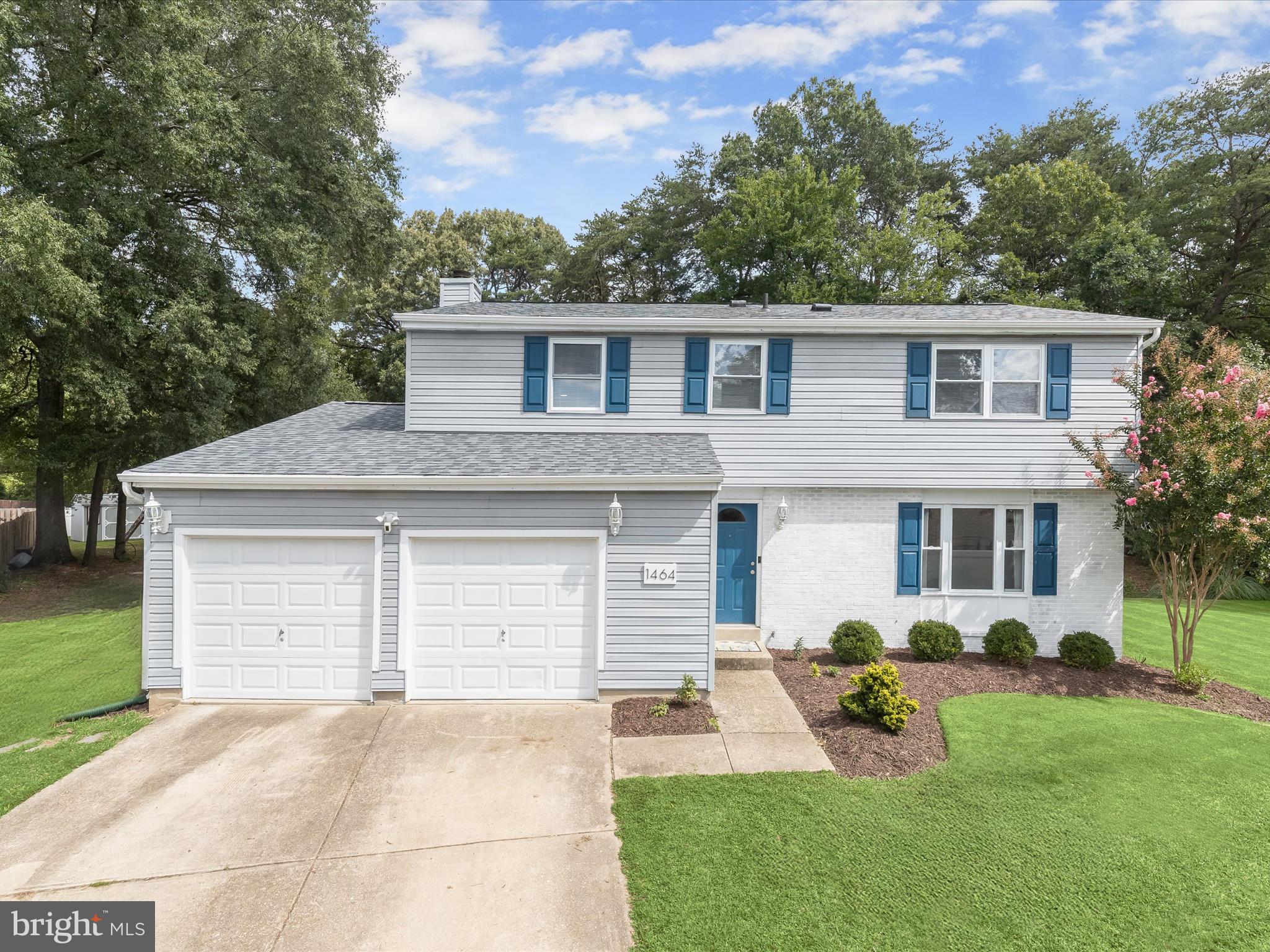Set back from the street and backing to trees, this beautifully updated single-family home offers three finished levels of comfortable living in a prime commuter location. Perfectly situated near BWI Airport, Fort Meade, and major commuter routes, it provides easy access to Baltimore, Washington, D.C., Annapolis, and Columbia while remaining close to everyday conveniences. Step inside to a welcoming foyer that opens to a spacious living room, seamlessly flowing into the dining room, an ideal layout for entertaining or everyday gatherings. The kitchen features sleek appliances including a cooktop and wall oven, a breakfast area with deck access, and a pantry recently added for extra storage. Just off the kitchen, the family room invites relaxation with its wood-burning fireplace, creating a cozy atmosphere year-round. Upstairs, the spacious primary bedroom impresses with updated laminate plank flooring, a walk-in closet, and a private en-suite bath complete with a double sink vanity and a glass-door shower. Three additional bedrooms and a full bath complete the upper level, offering plenty of space for family and guests. The renovated lower level extends the living space with a bright recreation room, walkout access to the backyard, and a half bath. A dedicated laundry area and generous storage ensure functionality and convenience. Outdoors, a composite deck overlooks the private, tree-lined backyard, perfect for morning coffee, weekend barbecues, or quiet evenings. A storage shed provides room for tools and gear, while the attached two-car garage adds additional convenience. Thoughtful updates throughout include a new roof, heat pump, air handler, renovated basement, updated flooring in the primary bedroom, painted kitchen cabinets, modernized light fixtures, and a refreshed half bath, making this home move-in ready. The location combines comfort with connectivity. Enjoy a wealth of nearby amenities including shopping, dining, and entertainment at Live! Casino, plus a variety of grocery stores, retail centers, and restaurants. Outdoor enthusiasts will appreciate nearby parks, walking trails, and community recreation options. For commuters, I-95, MD-295, MD-100, and MD-32 are within easy reach, while BWI Airport and the Dorsey MARC station are just minutes away. This home balances style, comfort, and convenience in a sought-after setting, offering both a peaceful retreat and unbeatable accessibility.