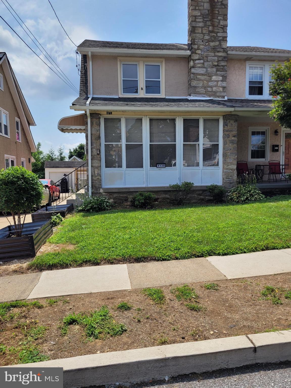Welcome to this four-bedroom two full bath nice size twin in Drexel Hill. When you walk up the front steps you enter into the enclosed porch that you can enjoy sitting out there and enjoy your cup of coffee or tea in the morning or at any time of the day. As you enter the front door you have a nice size living room with a fireplace, split AC/Heat unit, formal dining room and hardwood floors. Off the dining room is the eat in kitchen that has plenty of cabinets with a ceramic tile floor, an exterior door that goes out to the nice size deck that was just refinished, has an awning that will keep you cool on those sunny days and steps that go to the back yard that is partially fenced in and the detached garage. The upstairs has four nice size bedrooms, two of the bedrooms also have the split units in them, hardwood floors and a full bath. The basement is finished with a full bath and has plenty of storage. There is a security system that the owner had put in it's in the living room it just has to be reconnected. The owners did a lot of improvements in 2023 everything is disclosed on the disclosure of what they did. This a must see add it to your list and come take a look.