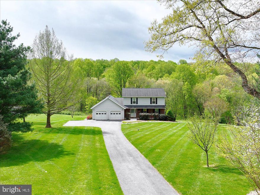 FIRST OPEN HOUSE WEEKEND!! ---- SATURDAY APRIL 25TH  12N - 2PM   AND   SUNDAY APRIL 26TH 1-3PM
Welcome to Cabin Branch Farm in Woodbine—where privacy, space, and everyday comfort come together.
Tucked at the end of a long private drive, this updated colonial sits on 3 peaceful acres backing to the natural beauty of Patuxent River State Park—perfect for quiet mornings and relaxed evenings on the covered deck.
Inside, the heart of the home is a bright, gourmet kitchen featuring granite countertops, stainless steel appliances, a coffee/bar station, and a sunny eat-in area with serene backyard views. It opens seamlessly to a vaulted family room—ideal for gathering and entertaining.
Upstairs, the spacious primary suite offers a beautifully renovated bath and spacious walk-in closet, with two additional large bedrooms and updated hall bath. The large walk-out lower level is ready for your vision.
A setting that feels like a retreat—yet designed for the way families live today.
Homes with this much land, this kind of kitchen, and this level of peace don’t stay available—schedule your private showing today before someone else claims your escape.
MAJOR UPDATES ALREADY DONE FOR THE NEW BUYERS!!  Furnance and HVAC (2010), Hot Water Heater (2015),
 Roof (2015), Kitchen (2016), All Bathrooms (2019), Anderson Sliding Glass Door in family room our to deck (2020), Septic Tank evaluated and pumped (2022),  New Carpeting (2022),  new well pressure tank & upgraded water filter (2023), well water manifold in basement (2025), AND MORE!!