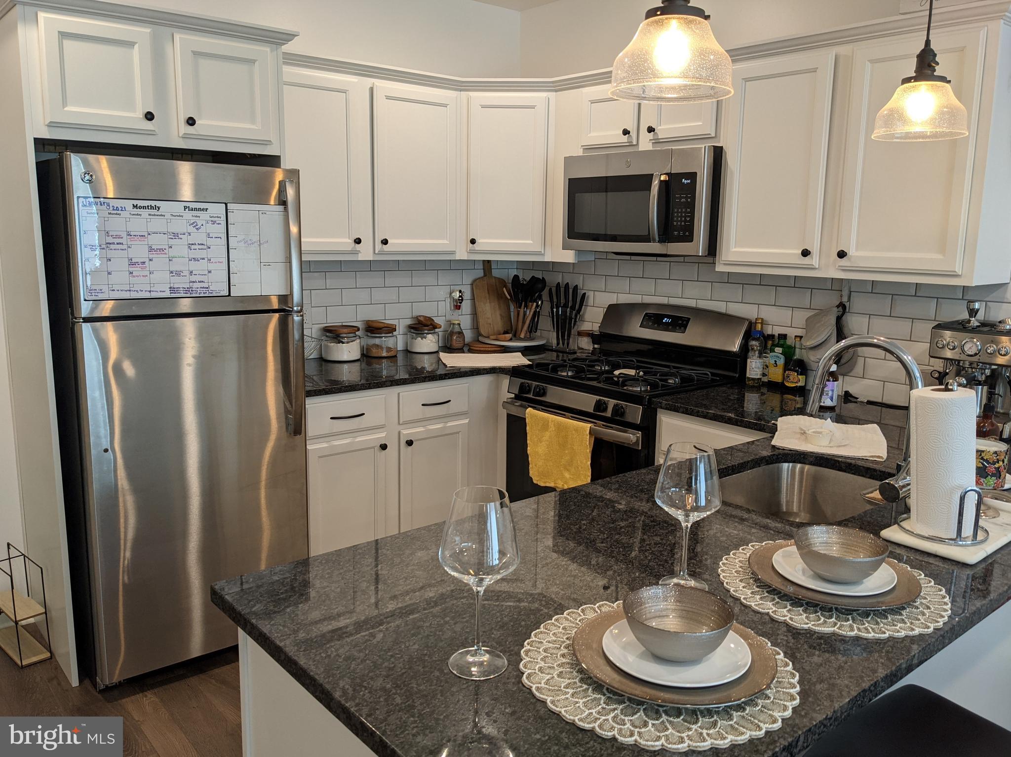 Available August 1st - Come home to this chic and modern 1-bedroom home in the heart of Roxborough's bustling Ridge Avenue corridor! Conveniently located to shopping, dining, public transit, and more. Your new home includes a fully-equipped kitchen with stainless steel appliances, custom granite countertops, and a built-in breakfast bar! Chores are a breeze with your own washer/dryer and easy-to-clean wood-inspired plank flooring throughout. Fitness center access and secure package lockers are included in the rent. Plus, 6615 Ridge Avenue is 100% pet-friendly with NO fees or breed/size restrictions! This home will not last - apply today!