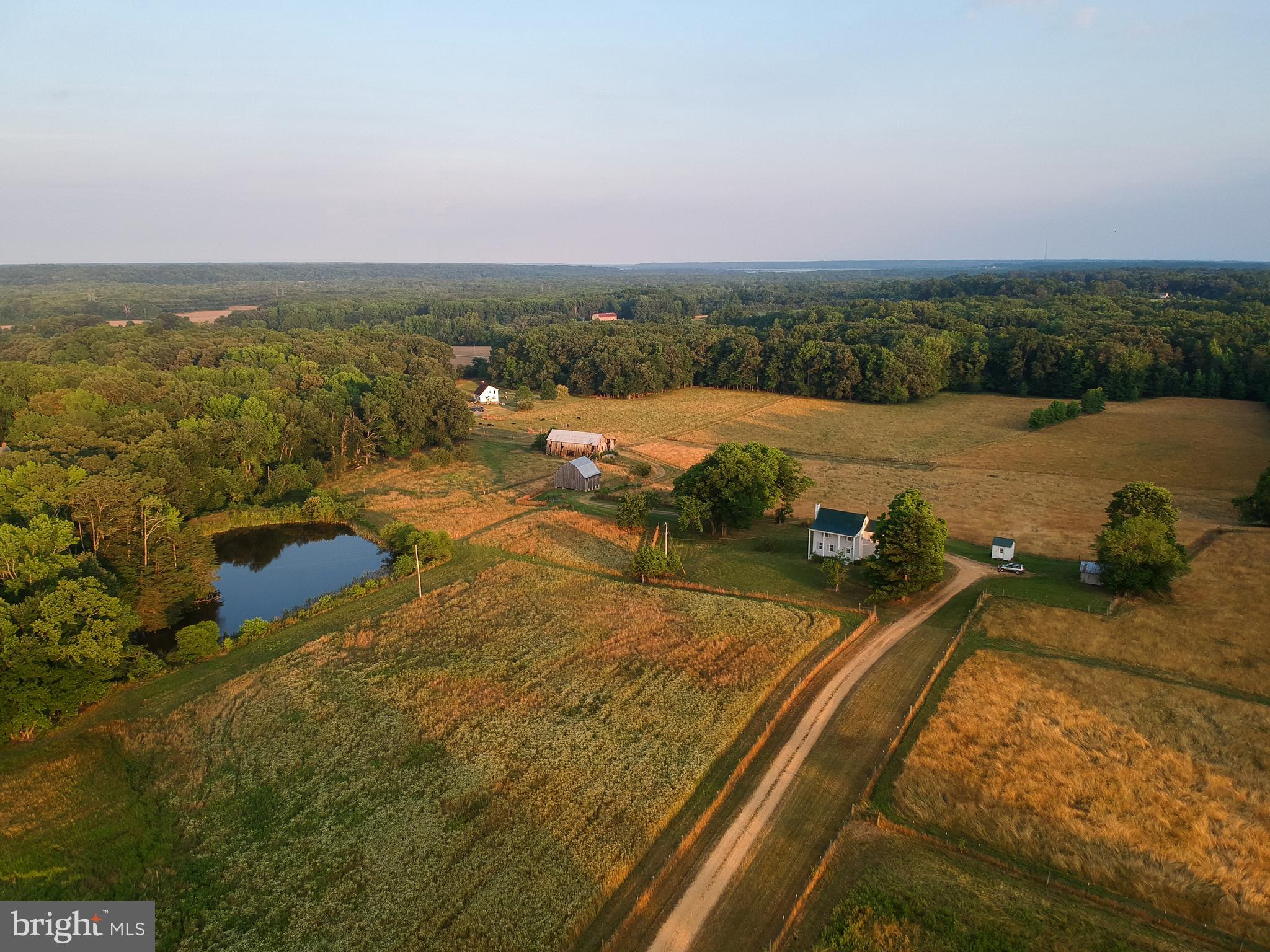 Welcome to 9885 Heatherstone Drive! This property offers 42 +/- acres in Bel-Alton, MD. The existing home has three (3) bedrooms, one (1) bath and one (1) 1/2 bath and is surrounded by farmland as well as woods offering privacy in a serene farm like setting. Move-in ready with an opportunity to customize your own country retreat. The property includes several barns and outbuildings. Open fields are currently fenced and used for cattle. There are endless possibilities with this country property.