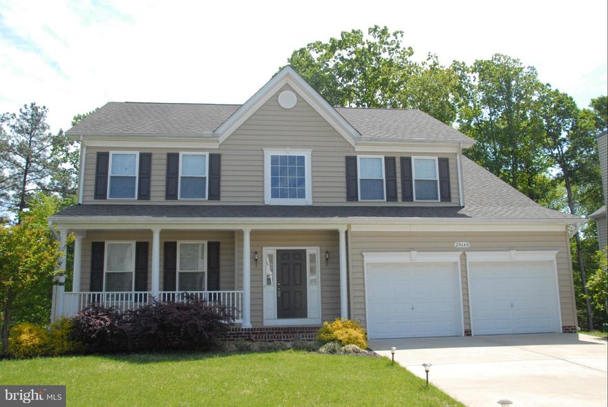 Beautiful Preston model on premium lot backing to trees at end of the cul-de-sac! Approximately 4000sq ft!  Finished basement with full bath, home theater system, and a wood shop!  Screened in porch to enjoy the privacy. Beautiful kitchen with hardwood floors, maple cabinets, corian counter tops, double ovens and more.  Security system throughout, sprinkler system, gas fireplace! It has it all!