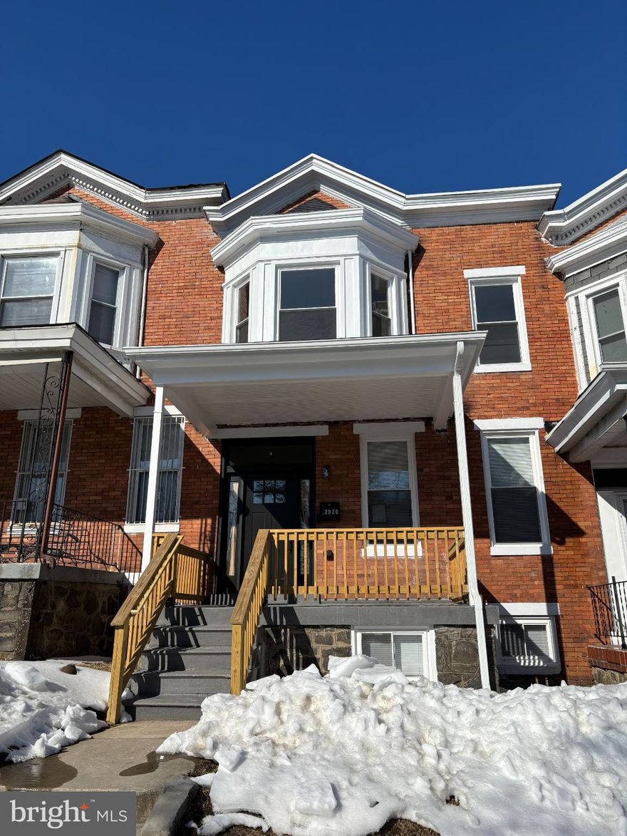 Exquisite bungalow-style townhouse that presents a unique opportunity to embrace a luxurious lifestyle in your dream home. A complete top-to-bottom renovation has been completed, featuring all new plumbing, electrical, and HVAC systems.  The renovation has provided modern updates while maintaining the historical charm.  Spanning more than 1,440 square feet, this residence boasts three spacious bedrooms and two and a half elegantly appointed bathrooms. A large entry area flows into the generous living room and dining room.  The heart of this home is undoubtedly the gourmet kitchen, featuring an inviting island and a spacious pantry, perfect for culinary enthusiasts and casual cooks alike.  The primary suite is a true retreat, featuring a bay front design that floods the room with natural light, complemented by a generous walk-in closet and a beautifully designed primary bath. The thoughtful layout ensures comfort and privacy, making it an ideal sanctuary for relaxation. Two more spacious bedrooms and a full bath make up the rest of the second floor.  Step inside to discover a harmonious blend of modern elegance and classic charm. The interior showcases stunning heart of pine hardwood floors that flow seamlessly throughout the main living areas, while plush carpeting adds warmth to the bedrooms. Recessed lighting enhances the ambiance, creating a welcoming atmosphere perfect for both entertaining and quiet evenings at home. The partially finished basement offers additional versatility, whether you envision a cozy media room or a home gym. With a connecting stairway, this area can easily be transformed to suit your lifestyle needs. The spacious backyard provides ample options for barbecue and gardening opportunities.  Located in a vibrant urban setting, this property provides easy access to a plethora of dining, shopping, cultural experiences and easy access to Coppin State. This residence is not just a house; it's an invitation to a lifestyle of comfort, elegance, and personalization. You have the chance to shape this space into your ideal haven. Embrace the opportunity to create a home that reflects your unique style and aspirations.