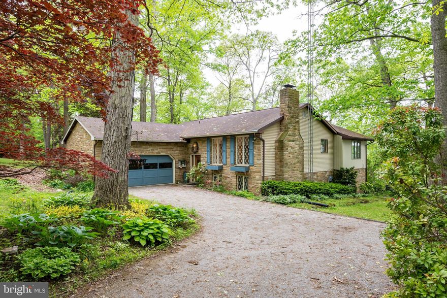 Welcome to this unique home with 4 bedrooms, three full baths and three fireplaces that sits on nearly 1 acre of wooded paradise just a short walk to the lake at Corduras! Enter through the front door where your eyes will immediately go to the wall of windows that frame out the huge great room with vaulted ceilings and impressive views out to the farmland and gentle rolling hills.  On your way you ll pass the living room with archways and beautiful built-ins  along two walls that frame out a wood burning fireplace.  A formal dining area with double doors flows into the kitchen and aforementioned great room with gas fireplace. The master and two other bedrooms finish off this level but more awaits downstairs with its sprawling family room w/ wood burning fireplace, fourth bedroom, huge exercise room or office, full bath, mud room with access to back yard, laundry room, storage and big workshop with double door access to back yard.  Also, new furnace and hot water heater in 2018! Plenty of gardens and tall beautiful trees sprinkle this beautiful lot that is one of a kind! Don t miss out!