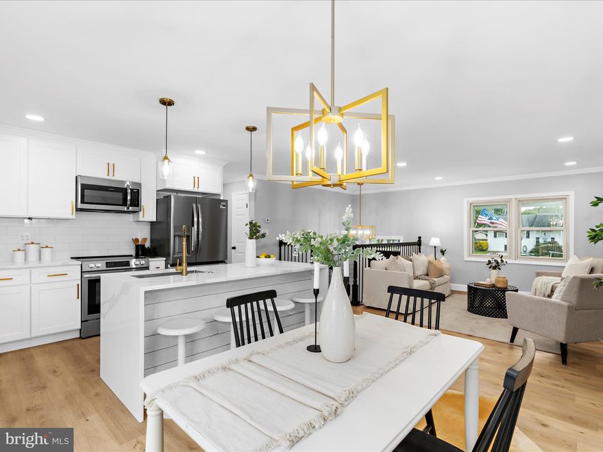 Stunning HGTV inspired renovation. This 4 bedroom, 3 full bathroom home is situated on a quiet culdesac and conveniently located to schools and shopping.  Nearly 2200 sq feet, this open concept floor plan is highlighted with custom accents and premium finishes throughout. Designer kitchen with quartz countertops and Eat in Island. Main level Owner suite with private bathroom and large walk-in closet.  You also will find  a dining area, family room with fireplace, additional bedroom and second full bathroom on this level.  Off the back of the house is a rear patio and fenced in  backyard.  Fully finished lower level with two more bedrooms, a 3rd full bathroom, rec room with wine bar and a kids play area.  New electrical, plumbing, and HVAC finish out your next home.