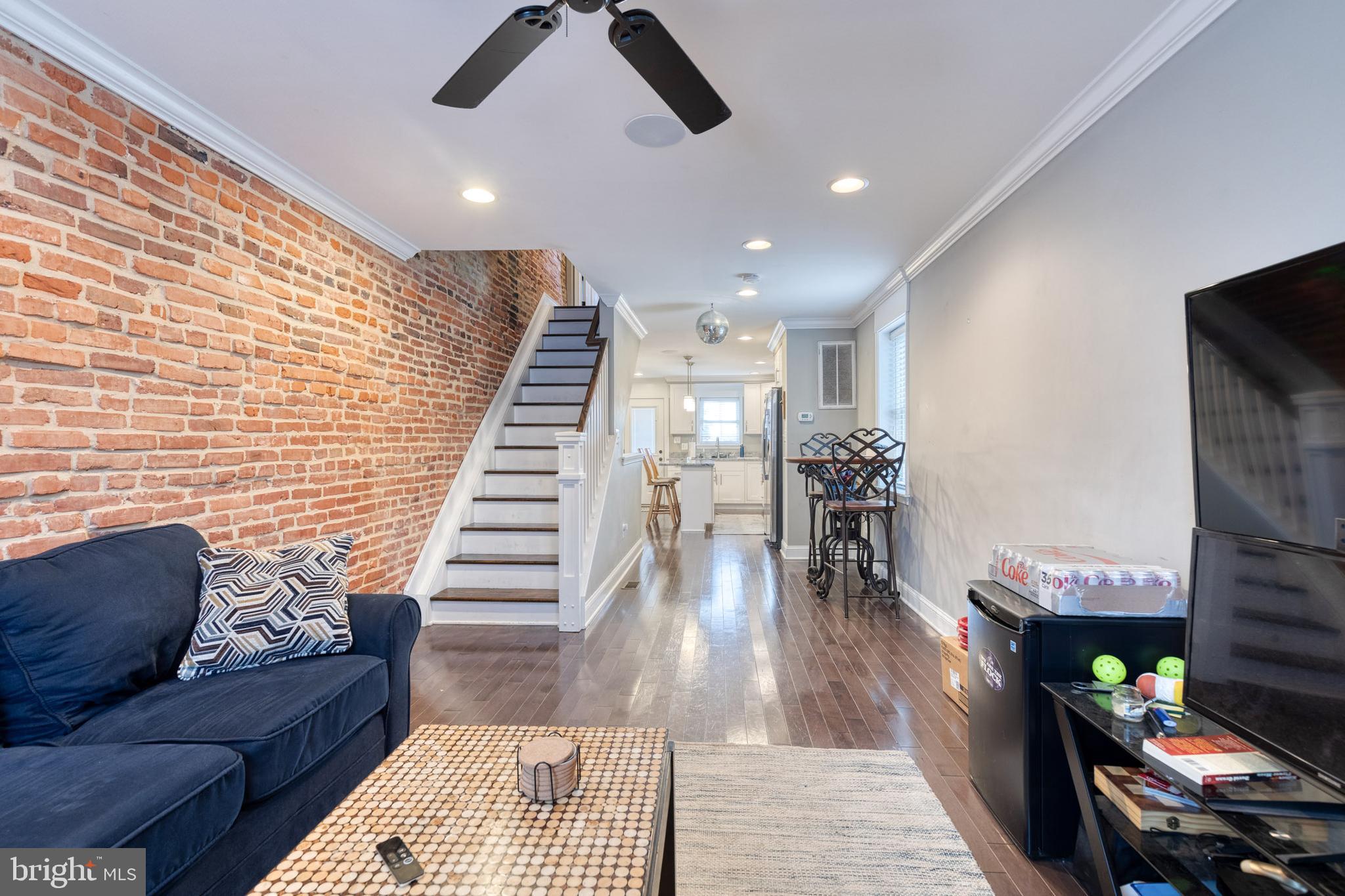 For rent in Canton! This spacious row home was previously renovated from top to bottom and boasts two bedroom suites with private bathrooms, plus a third bedroom and full bath in the lower level. Hallway access to the rooftop deck with amazing city & water views. Featuring hardwood floors, a large island in the kitchen, granite counter tops, stainless steel appliances, sleek custom cabinetry & a fully finished basement. Plus, an off-street parking pad! There's nothing to do but move in!