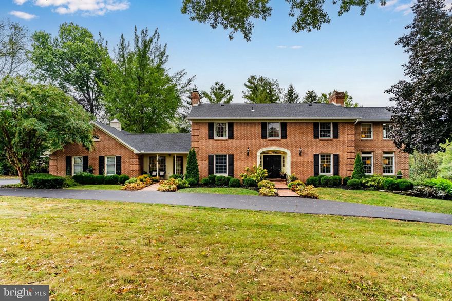 Stunning Cumberland Valley School District home tucked close to the 14th hole of the West Shore Country Club. Perfectly positioned on a beautifully landscaped 1+ acre corner lot, this property offers serene outdoor living with a water feature and fountain, inviting patio with fireplace, and a circular driveway.  Inside, you’ll find gorgeous hardwood floors throughout and a layout designed for both everyday living and entertaining. The fully remodeled chef’s kitchen is a dream—equipped with a 6-burner Wolf gas oven and range hood, steam oven, marble countertops, butcher block island, farm sink, integrated refrigerator, two dishwashers, beverage fridge, and built-in wet bar. Enjoy meals in the sun-drenched breakfast nook or the breakfast room overlooking the pond. The grand dining room with gas fireplace is truly show-stopping in scale. Additional first-floor highlights include a light-filled sunroom with radiant heat floors, a cozy sitting room with parquet floors, built-in shelving, and fireplace; a perfect place to relax with a book, plus a private office and half bath.  Upstairs, the spacious primary suite is a private retreat with vaulted ceilings, French balcony, four closets, and a spa-like en suite bath featuring separate vanities, soaking tub, and tiled stall shower. Three additional large bedrooms share a hall bath with double vanity and enclosed shower room. The lower level offers a partially finished basement with hangout space and home gym, along with generous unfinished areas for storage.  Located in the highly regarded Cumberland Valley School District, this home offers easy access to major highways, shopping, dining, and all the amenities of both Camp Hill and the West Shore. Combining timeless elegance, thoughtful updates like the BRAND NEW ROOF, and an unbeatable location, 3517 Foxcroft Drive is a rare opportunity not to be missed!  Schedule your private tour today!