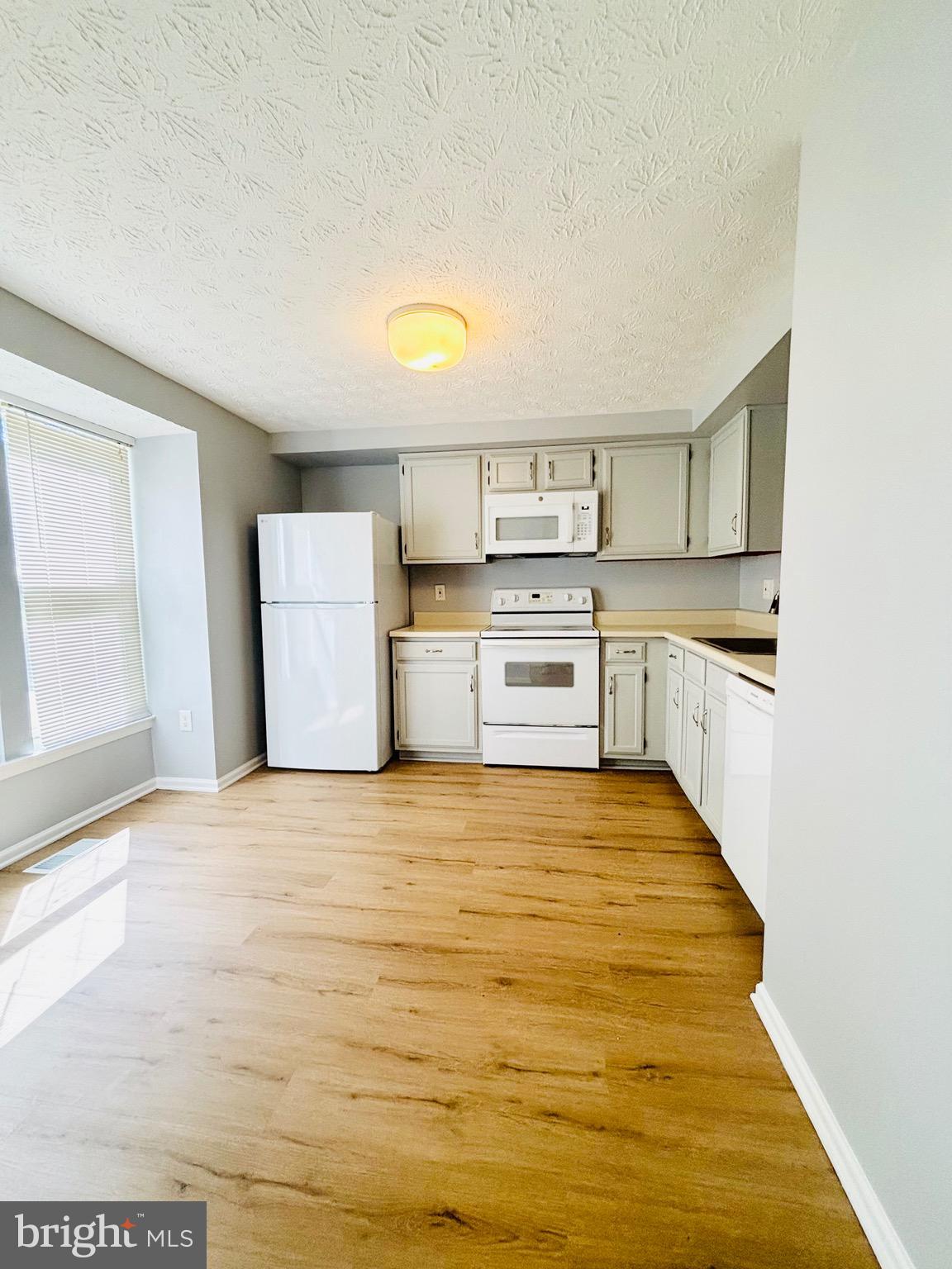 1410 POINT O WOODS COURT