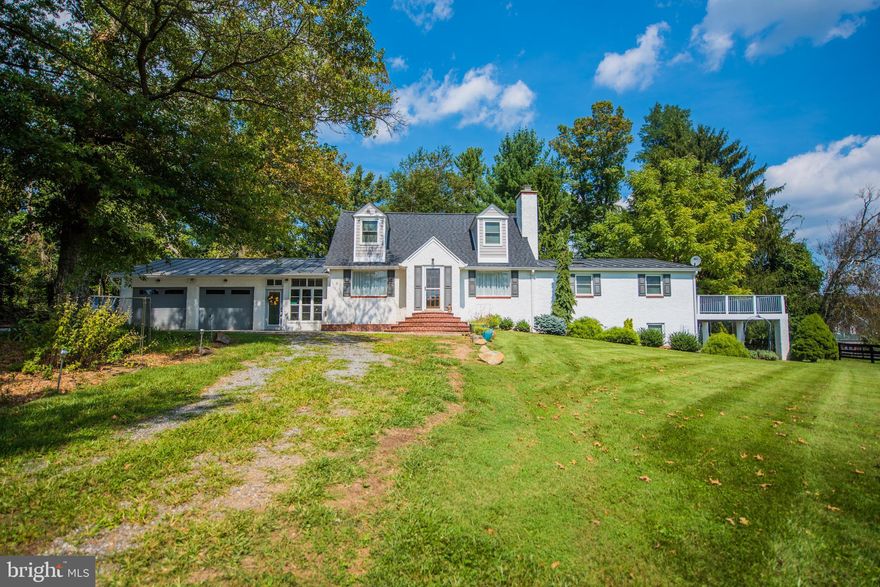 Serenity is found, Spacious cape cod on over 7 acres in picturesque setting. Large deck off master suite with large walk in shower and jacuzzi. All on main level. Oversized two car garage with loads of storage space. Attached to house via breezeway. Downstairs offers large space for family room or could easily be master suite apartment with full bath.