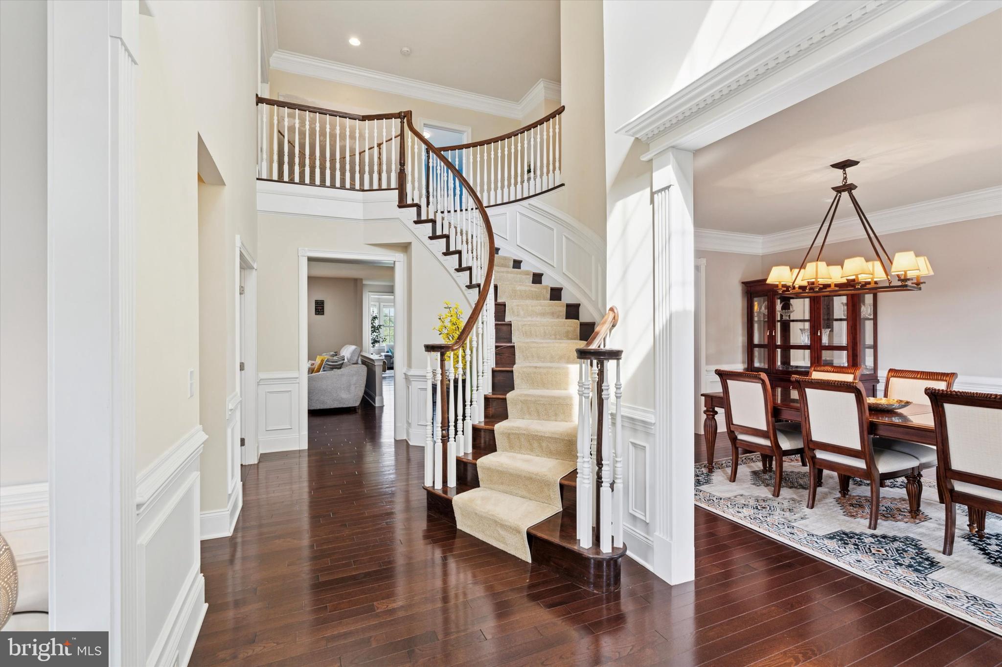 Welcome to 168 Pratt Lane, a truly special home in the heart of West Chester's coveted Unionville-Chadds Ford School District. From the moment you approach the charming covered front patio, you'll feel the unique appeal of this residence.
As you step inside, you'll be greeted by an impressive staircase that welcomes you home, setting a tone of elegance and warmth. A formal living room and dining room flanks the two-story foyer. Throughout the home, you'll discover extensive molding, beautiful hardwood floors, and exquisite finishes that speak of quality and attention to detail. Just beyond the formal rooms, a versatile home office and a half bath offer potential for a main-level bedroom suite.
The rear of the home is a stunning open-concept space designed for both daily life and grand entertaining. The gourmet kitchen features an expansive center island with seating, stainless steel appliances, and gorgeous granite countertops. The sun-drenched family room, anchored by a cozy gas fireplace, boasts some of the most magnificent views in the neighborhood, overlooking the serene community open space and the woods beyond. A sunroom adjacent to the kitchen is the perfect spot for a quiet moment or a pre-dinner cocktail. Step outside onto the paver patio to fully appreciate the spectacular, private views.
Upstairs, the luxurious primary suite offers a custom-tiled shower, a large soaking tub, and dual vanities for a spa-like experience. Three additional bedrooms on this level each feature their own private en suite bathroom. At the end of the hall, a second-floor family room—currently used as a home theater—provides the perfect space for movie nights or a teen hangout.
The home's lower level is a true bonus, with a partially finished basement featuring extra-high ceilings and a full daylight walk-out exit. A fully finished bedroom space on this level with a large walk-in closet, a second home office, professional workspace.
With its outstanding school district, central neighborhood location, and magnificent views from nearly every room, this home is an exceptional find. Ideally located just minutes from downtown West Chester, top-rated schools, shopping,
dining, and major commuter routes—plus close proximity to Longwood Gardens, a beloved regional attraction. Don’t
miss this rare opportunity—schedule your private showing today! Come and see for yourself why you’ll want to call 168 Pratt Lane your new home.