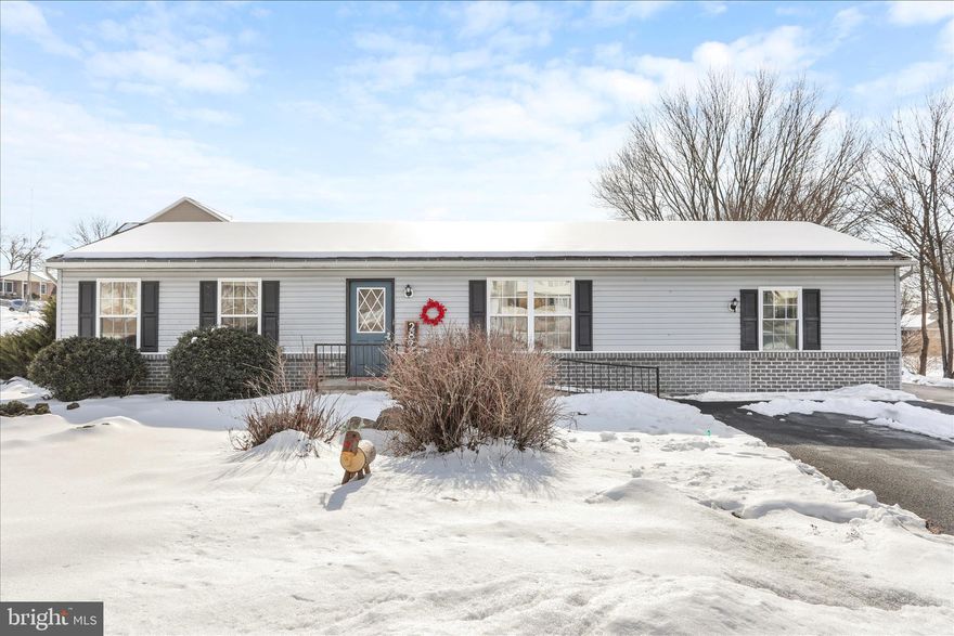 Welcome home to easy, one-story living in the heart of Spring Valley Estates. This lovingly maintained 3-bedroom, 1 bath ranch was designed for comfort, convenience, and everyday ease, with thoughtfully added interior and exterior accessibility features that make the home welcoming for all.  The inviting living room is a natural gathering place, while the oversized primary bedroom offers a peaceful retreat at the end of the day. Step out back onto the rear deck- added April 201-where mornings begin with coffee and evenings are made for relaxing or entertaining friends. Surrounded by nicely landscaped front and rear yards, with a handy shed for storage, the setting feels calm and cared for. Just outside of town, you'll enjoy a quiet, country feel without giving up the convenience of being only minutes from grocery stores, restaurants, and everyday essentials. This is the kind of home that makes life feel simpler-and a little sweeter.