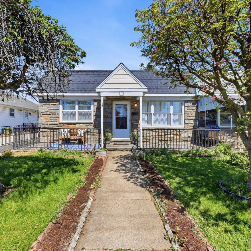 This charming twin home offers a perfect blend of classic appeal and modern comfort. Nestled in a serene suburban neighborhood, this residence features a traditional floor plan that invites warmth and togetherness. Spacious, updated Eat-in modern kitchen. (no dining room) With three spacious bedrooms and one and a half bathrooms, it's designed for both relaxation and entertaining.  Natural light pours in through the windows, highlighting the rich hardwood flooring that flows throughout the main living areas. The mostly finished basement offers additional living space with a walkout entrance, providing endless possibilities for a playroom, family room, home gym, or extra storage.  Outside, the property boasts a well-maintained front yard with lovely landscaping, front slate porch and a level rear yard, perfect for outdoor activities or simply enjoying the fresh air. The stone retaining walls and exterior lighting add a touch of elegance to the exterior, while the driveway accommodates two vehicles with ease.  This home is just a short distance from essential amenities: shopping, restaurants-including the Famous Clam Tavern. With an airport less than 5 miles away and a bus stop within a mile and  The nearby commuter rail station(Clifton/Aldan station) further enhances accessibility, making commuting a breeze.   The neighborhood is adorned with sidewalks and street lights, promoting a safe and inviting atmosphere for evening strolls or morning jogs. This property is not just a house; it's a place to create lasting memories. With its blend of comfort, convenience, and community spirit, it's ready to welcome you home. Brand New Roof! Don't miss the chance to make this delightful residence your own! Brand New, State of the art - Clifton Heights Middle School is opening in August.