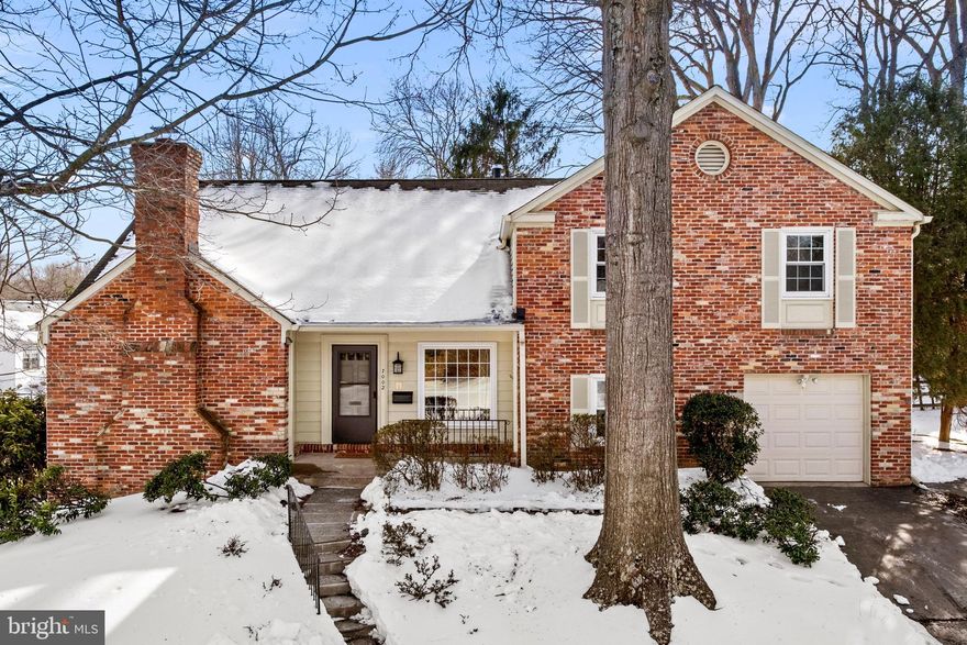 OPEN SAT & SUN 11-1! Nestled in the heart of Old Farm, this gracious brick colonial combines a generous floor plan with timeless style. Step inside to fresh paint, hardwood floors, and a spacious foyer. The expansive living room with wood-burning fireplace adjoins a formal dining room with warm southern light. The kitchen was recently updated with marble countertops, subway-tile backsplash, and stainless steel appliances. Enjoy your morning joe in the sunny breakfast nook. Just beyond, the family room offers a second (relined) wood-burning fireplace and access to a yard built for hosting with a huge bluestone patio. A main-level den with built-ins and powder room offers flexibility for working from home or hosting guests. Upstairs, there are four bedrooms plus a huge bonus room off the primary suite. Use this flex space as a second office, nursery, lounge, or hobby room! The wood floors in the primary suite and bonus room were recently refinished. For convenience, there's also an optional laundry hookup upstairs. The finished basement adds even more living space with a full bath, den, laundry area, and ample storage. Additional home updates include new gutters in 2022, LVP flooring in the basement, and a whole-house generator. The Old Farm neighborhood is celebrated for its welcoming spirit and year-round community events, including a 4th of July parade, summer picnic, and winter party. Enjoy two community pools (membership required) as well as Tilden Woods Park nearby. The location is unbeatable with quick access to I-495 and I-270, Park Potomac, Pike & Rose, Cabin John Shopping Center, and Downtown Bethesda.