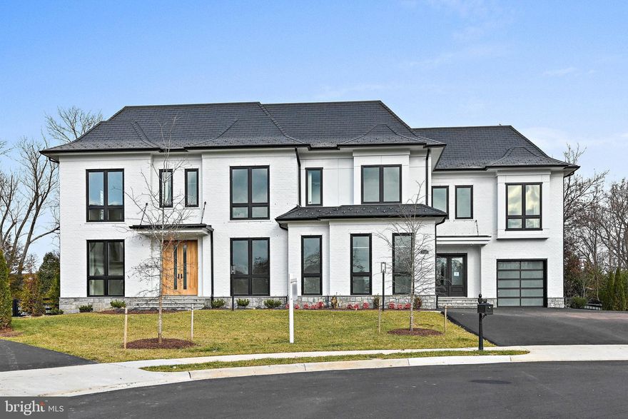 Call the showing contact  Priscilla for an appointment.  This truly exceptional home is located in our luxurious community of Halls Manor, in one of the most desirable neighborhoods in Mclean. 13 min. drive to Georgetown in our nation’s capital.
 Nestled within a Serene Cul-de-sac you will find our impressive Waterford model on lot . Bringing a pleasing blend of traditional and a host of modern amenities with sophisticated design elements. This 10,478 sq ft  (inside and outside living area) home features 6 bedrooms and 7.5 baths.
Setting the tone for a great first impression with 9ft Sapele Mahogany front doors. When you first walk in you are stunned with our 11 ft ceilings, This lends a very grand feel to the space. The 5 inch Solid American white oak floors set a beautifully warm feeling throughout the home. Our signature floor-ceiling windows offer plenty of natural light, to bring the outdoors inside. The Waterford has a cozy feel with our extensive trim package which includes 10 inch base boards, 8 inch crown trim and 5 ½ inch casing around the windows and door ways.
  The Main Level features a light-filled Family Room, Formal living room, Dining room &  main level suite with f/ bath. The suite has its own private entrance w/car garage. Our homes in Halls Manor feature an elevator to all 3 floors.
  The gourmet kitchen is outfitted with top-of-the-line Viking s.s. appliances.  The expansive area for meal prep also provides  room for storage and entertaining. There is a 6 burner range, custom door fridge, two dishwashers, two sinks, pot filler and beautiful two-tone custom cabinetry. Continuing in the kitchen we have a butler’s pantry with an additional fridge, a Miele Coffee machine and storage for all of your ingredients and snacks . 
The Main Level additionally Features a porcelain tile double sided fire place, butlers wet bar with a sink, beverage fridge, mud room and 3 car garage with epoxy flooring. 
One of the most breathtaking details of this delightful home is the owner’s suite with its own screened in porch, wet bar, sitting area and double sided fireplace. The luxurious owner’s bath features heated floors, steam shower, two toilet rooms, two walk in closets, one with its own island, and a spa like tub fit for a royal bath.
Enjoy 4 generously sized bedrooms on the Upper Level Including a bonus suite in its own secluded side of the home. All bedrooms feature a walk-in closet and on-suite bath. Continuing the upper level you will find a loft waiting for you to turn into an office, playroom, or upper lounge area. Also the large laundry room comes with 2 washers and 2 dryers. All these areas are accessible by the main staircase or a secondary staircase.
As you make your way down to the lower living area, you will find a whole other world to explore. First you are greeted by an open floor plan space to make it your own. The lower level is equipped with a full wet bar with a stunning waterfall quartz island in a suede finish including a dishwasher, beverage fridge, ice maker and Microwave. Other features include a walk-up basement and lower-level exercise room. Enjoy a day at your own relaxing spa with sauna, steam shower and heated floors. You will also find the 6th bedroom w/full bath and walk in closet. Let’s not forget the tasting room separated by a beautifully done glass door, full of storage for all your wines and beverages.
 Beautiful trees provide privacy for outdoor entertaining. Outside of the family room is a covered porch with electronic retractable screens. Beautifully finished with James Hardy paneling w/ double sided fire place looking in to the family room.
Moving along with the outdoor space you will find a full outdoor Kitchen with sink, grill, storage and Deckton counter tops. Next to the outdoor kitchen the lounge area with an outdoor fireplace, w/room for dining table and  seated gathering areas
 Find us on Google.  Premier