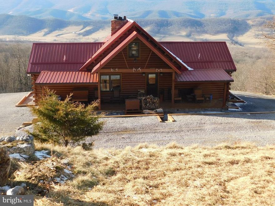 World Class Views, Second to None!  Take in the Panoramic Views at an elevation of 3017 ft, overlooking the Beautiful Germany Valley.  Spruce Knob can also be seen from this  fully furnished 2 Bed, 2 -1/2 Bath beautifully maintained Log Cabin!  Located in Seneca Lookout. The easy access private gravel drive connects to state maintained road.  Good well water. Borders National Forest and North Mountain Hiking Trail (27 miles long). Close proximity to Timberline, Canaan Valley & Snowshoe Resorts. Also conveying are: Mowing Tractors & Equipment to maintain the roads and open fields. Some covenants & restrictions apply.