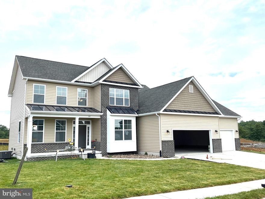 Pre-Sale...Custom Grand Colonial Home offering over 4300 sqft of living space with 5 bedrooms and 3.5 baths.  Entry 2-story foyer w/ curved stairs and 9ft ceilings on main level.  Features include spacious Family Room, upgraded kitchen w/ island bar, built in wall oven, natural gas stove, pantry, and granite countertops, additional separate dining and living rooms, sunroom and private den/ study with bay windows on main floor. The Master bedroom has tray ceilings, 2-walk-in closets, and full bath w/ tiled shower w/ glass door. The fully finished basement has large 27ft rec room, 5th bedroom, full bath, wet bar, separate flex room and storage room. Home comes with brick front, full front porch, added additional windows and Extended 3-car garage with auto openers.   Natural gas hvac, hot water, & kitchen/ appliances, 2x6 energy efficient construction on almost 1/3 ac lot.  Photos are similar construction