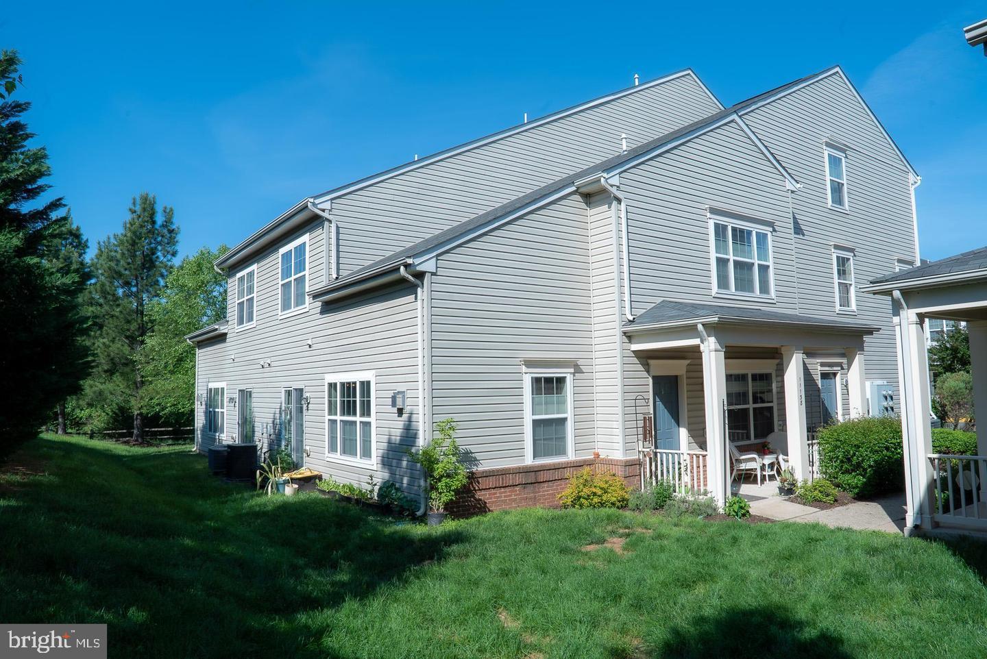 Welcome home to this wonderful, townhouse style two level condo in lovely Chatsworth Village by Historic Manassas! The immaculately maintained corner unit offers open concept floor plan with kitchen flowing to the dining area, and through the bright living room with fireplace. There is a main level primary bedroom for convenience, and another on the upper level with en-suite bath and walk-in closet, in addition to a bonus loft space overlooking the living room that can be your hobby room, office, additional sitting room, or however you use it. The kitchen has high-end SS appliances including gas stove, ample cabinet space and pantry. The home includes a one-car garage and driveway parking; additional guest parking tags available from condo management. Great location: minutes to shopping, restaurants, fun and entertainment… with Historic Downtown Manassas, National Battlefield Park/Bull Run Park (& let’s not forget the Winery!) nearby.