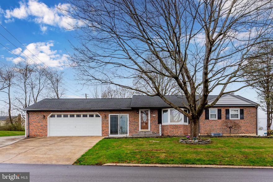 Very unique rancher in a great neighborhood. This home offers three bedrooms, 1.5 baths and a beautiful newer kitchen. Beautiful den off kitchen with skylights leads to a spacious landscaped backyard. Kitchen has custom cabinetry.  A finished lower level with 1/2 bath is an ideal spot for a game room, bedroom or gym.  Nice breezeway between the house and garage.  Garage is a 4 car garage, workshop, etc.  Fenced yard, whole house generator.  Great home for a car collector!