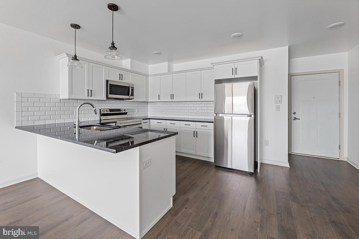Available August 1st - Spacious One-bedroom coming available at The Wright - a new construction apartment community in the heart of Roxborough! Your new home includes open-concept living/kitchen area, with fully-equipped kitchen including granite countertops and stainless steel appliances. Easy-to-clean wood-inspired flooring throughout, plus in-unit Washer/Dryer, and intercom system. PTAC climate control allows temperature set by room so you're comfortable year-round. All residents at The Wright can access the green roof deck, and off-site fitness center for no additional charge. Plus, The Wright is100% pet-friendly with no additional fees. This home is a must-see - apply today!