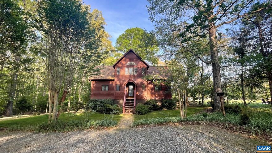 Enjoy lake living at its finest on the public side of Lake Anna in the highly sought-after, gated community of Windwood Coves?complete w/ HS internet & an assigned boat slip. This beautifully maintained 2,454 sqft home offers 3 BDRMS, 3 BTHS, & a versatile loft space. The inviting great room showcases a vaulted ceiling & a dramatic floor-to-ceiling stone gas FP, creating a warm & open atmosphere. The eat-in kitchen is thoughtfully designed w/ quartz countertops, a coffee bar, subway tile backsplash, white KraftMaid cabinetry, & stainless steel appliances?perfect for both everyday living & entertaining. Hardwood flooring flows throughout the home. The main level features a spacious bdrm & a full bth w/ tile flooring, double vanity w/ marble countertop & a walk-in shower. Upstairs, you?ll find the primary suite complete w/ stylish barn doors, open loft area, & a full BTH featuring a freestanding soaking tub, walk-in shower w/ bench, quartz vanity, & custom built-ins. The finished walkout basement expands your living space & a cozy gas FP, family rom, rec area, large BDRM, full bth, & utility rm. Outdoor living is just as impressive w/a freshly painted back deck, covered porch, patio area, and a pergola.,Quartz Counter,White Cabinets,Fireplace in Family Room,Fireplace in Living Room,Fireplace in Rec Room