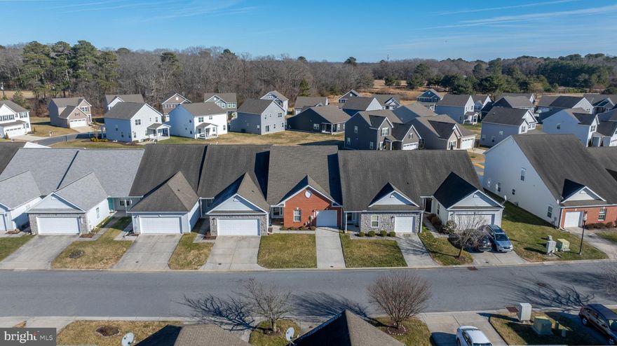Welcome to this charming one-story townhome in the desirable Woodcreek community of Delmar, Maryland! This well-maintained 2-bedroom, 2-bath home features a brand-new roof (2024), NEW AIR CONDITIONING AND FURNACE (2021) with an attached one-car garage.
Step inside to a welcoming foyer, with the first bedroom located immediately to the right—perfect for guests or a home office. The open layout flows into a bright living area and a beautiful three-season room finished with porcelain ceramic tile, ideal for relaxing year-round.
The kitchen is equipped with stainless steel Whirlpool appliances, and the home features a tankless water heater for energy efficiency. The property is currently enrolled in an energy efficiency program with Delmarva Power, helping to keep utility costs low.

Comfort, efficiency, and easy one-level living all come together in this lovely Woodcreek home.
