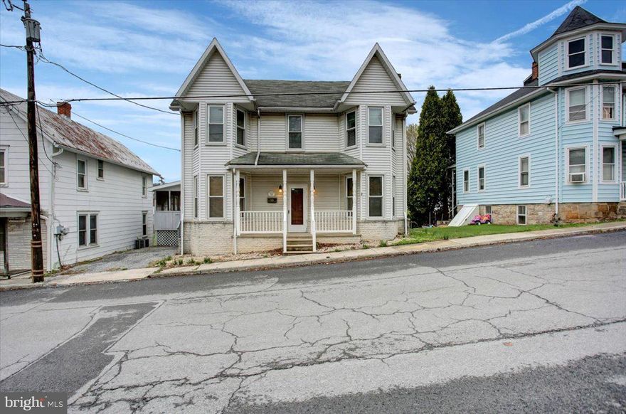 Step into this beautiful 3/4 bedroom, 2 bathroom Victorian home with over 2,000 square feet of comfortable living space. You'll love the bright, open layout and generously sized rooms. The cozy family room includes a pellet stove for added warmth. Enjoy quiet mornings or evening gatherings on the large screened-in porch. A finished attic offers bonus storage. Just minutes from town—move-in ready and waiting for you! All offers are due by Tuesday April 15th at 5:00 PM.