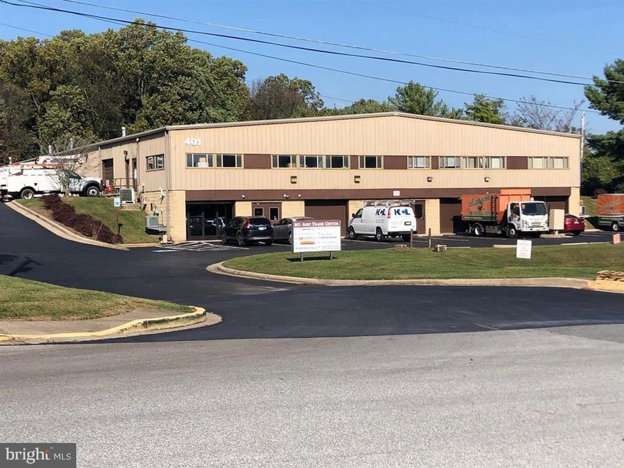Commercial space for sale on Center Street in Mount Airy MD.  Unit 1 is 1,214 sf and features a 10' x 8' Overhead  Door with Glassdoor Entry Way, Ceramic Tiling, Exposed Ceiling Venting, Open Space with a Modern Bathroom.  Currently tenant occupied as office/warehouse space.  Property is conveniently located within the Town of Mount Airy with easy commuter access Routes 27 & 26 and I-70.  Unit is available for owner occupants or investors.