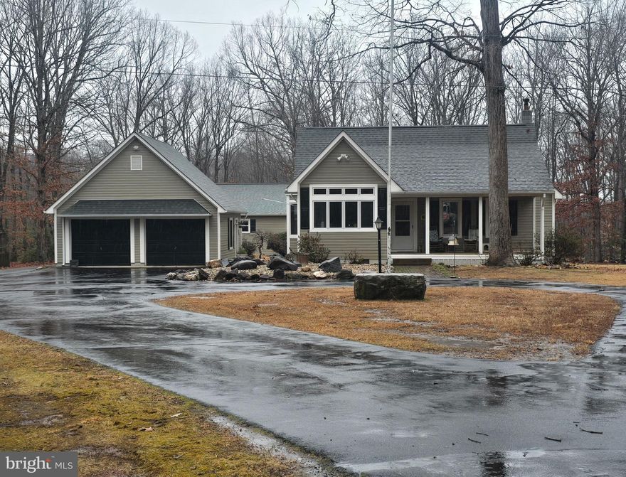 COMING SOON! This custom home offers a unique style and peaceful setting providing the perfect combination of privacy and convenience. Situated on 10 acres of country living just minutes from I64. This beautifully designed home offers over 1600sqft of living space in the main dwelling along with an abundance of other usable space throughout the property.  Including a 2-car detached garage adjacent to the house, a 2nd detached garage located behind the house which encompasses an accessory apartment & workshop, an oversized workspace with a car lift and plenty of additional space for your needs. This home comes equipped with a whole house generator and so much more. More details to come soon.