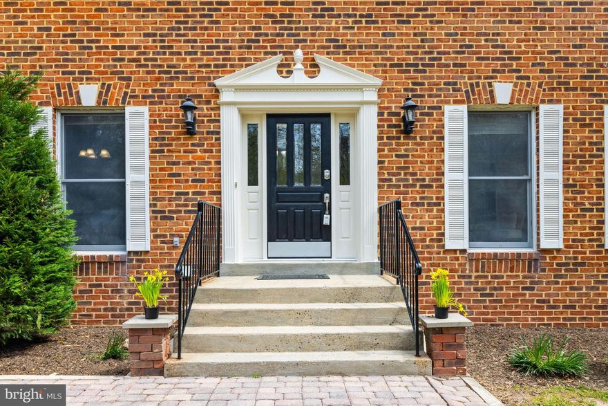 Nestled on nearly 8 wooded acres and surrounded by thousands of acres of protected parkland, this exceptional 5-bedroom, 3.5-bath estate offers a rare blend of privacy, space, and refined living—just minutes from major commuter routes, dining, and shopping.

From the moment you step into the grand foyer, you’re welcomed by timeless elegance with a formal living room to one side and a formal dining room to the other—both offering the perfect balance of comfort and sophistication. A beautifully designed butler’s pantry connects the dining room to the open-concept kitchen, adding function and flow for effortless entertaining.

The heart of the home opens to a spacious, light-filled family room featuring a cozy pellet stove and direct access to the expansive deck overlooking the backyard oasis. The kitchen includes custom built-in seating for dining, perfect for casual dining or morning coffee, and flows seamlessly into the open family room and dining spaces, designed for connection and comfort.

Upstairs, the luxurious primary suite serves as a private retreat with its own sitting area, a massive custom walk-in closet with built-ins, and a spa-inspired bath complete with soaking tub, dual vanities, and separate shower. Additional bedrooms offer generous space and natural light.

The fully finished walk-out lower level is a versatile haven, complete with a second full kitchen, additional bedroom, media room, and a large rec room—ideal for guests, work, or recreation.

Step outside and enjoy a true resort-style setting: an in-ground pool, year-round spa, and a lodge-style outdoor pavilion with a stone fireplace create the ultimate space for outdoor living in every season.

Car and hobby enthusiasts will appreciate the two garages with a total of 4 garage spaces—one set up for potential electric vehicle charging. Two outdoor storage sheds provide ample room for tools, equipment, or creative pursuits.

This estate is a rare find—offering luxurious indoor and outdoor living, unmatched privacy, and a peaceful, natural setting that feels miles away from it all, yet conveniently close to everything. Call for your private showing today!