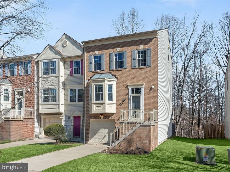 Nestled in the sought-after Bowling Brook community near Historic Savage Mill, this beautifully renovated four-level end-unit townhome offers modern updates, abundant natural light, and a thoughtfully designed layout. With a newly installed roof, fresh finishes, and updated spaces throughout, this home is move-in ready.
Step inside to find gleaming oak hardwood floors on the main level, leading to a stunning kitchen that is both stylish and functional. White 42-inch upper cabinets contrast beautifully with espresso-toned lower cabinets, while granite countertops, stainless steel appliances—including a double convection oven—and a built-in stone-topped breakfast bar complete the space. A large bay window in the kitchen bathes the area in natural light, making it an inviting place to start your day.
The dining and living areas flow seamlessly, with a convenient pass-through window from the kitchen to the dining room. The living room offers a cozy fireplace and direct access to the expansive composite deck, perfect for outdoor entertaining. Upstairs, the primary bedroom impresses with a vaulted ceiling, walk-in closet, and en-suite bath featuring a soaking tub. Two additional bedrooms and a tastefully upgraded full bath complete the upper level.
The lower level provides flexible living space with a family room, luxury vinyl plank flooring, a stylish full bath, and a laundry area with access to the garage. A sliding glass door leads to the patio, where you can enjoy serene views of the wooded backdrop. Additional features include newly installed windows, a humidifier, and ample parking with a private driveway and an additional reserved space.
Enjoy the community playground and nearby pool available with membership, as well as close proximity to local shops, the library, and schools. Commuters will appreciate easy access to I-95, Route 29, MD-32, and MD-100. With its prime location, thoughtful upgrades, and inviting spaces, this home is a must-see!