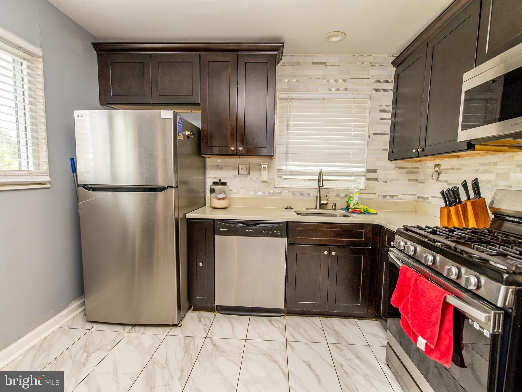 Come check out this beautifully updated, small but convenient, budget-friendly home just minutes from the D.C. line! If you're a first-time homebuyer or looking for an affordable option just outside the city, this charming property offers the perfect blend of value, convenience, and comfort.
Step inside and you'll find a bright, open-concept layout that makes the most of every square foot. Nearly everything has been upgraded for you: brand-new roof, gutters, siding, windows, water heater, HVAC system, stainless steel appliances, flooring, kitchen cabinets, bathroom, and doors—all thoughtfully selected to give the home a fresh, modern feel. The living space flows seamlessly into the updated kitchen.
Out back, enjoy a fully fenced yard with a deck and shed—perfect for morning coffee, pets, or weekend projects. There’s also a private parking pad out front, giving you off-street convenience that’s rare in this price point.
Located in Capitol Heights, you’re less than 10 minutes to D.C., close to major commuter routes, public transportation, parks, and shopping. With just a little extra TLC, this home could truly shine—whether you’re buying your first home or investing in the future.
Homes like this, at this price, in this location? They don’t last long. Schedule your showing today!