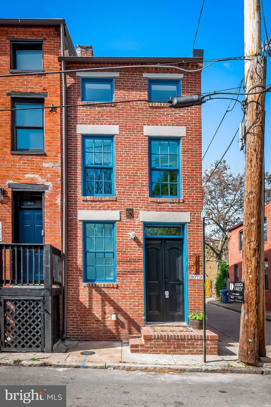 Absolutely beautiful, meticulous renovation of this late 1800’s Hollins Market, end of row, townhouse. Highest quality workmanship and materials everywhere! Thoughtfully designed, maximizing every inch of space. 10 Year CHAP Tax Credit in place saving a buyer tens of thousand of dollars over the next ten years based on a $55k assessed value. This mean the taxes will be $1567 per year or $131 per month for ten years.  The main level has a beautiful living room with custom built-ins and fireplace, half bath, and gourmet kitchen with lavish stone countertops, brushed brass hardware with counter seating and spacious dining area. The second floor has two generous bedrooms and a full bath. The third floor has a spacious primary suite with ensuite bath and additional space that would make a perfect office, nursery, or art or writing studio. Enjoy dining al fresco on a large, fenced rear patio by way of French doors directly from the kitchen. The owner even installed a dedicated gas line for a grill. The basement is accessed via a trap door on the main level. It is perfect for storage only. Hollins Market is a vibrant, homeowner neighborhood, convenient to University of Maryland, Hopkins, MARC Train to DC, I-95, I-83, downtown Baltimore, and Ravens and Oriole Stadiums. Lots of amenities at your doorstep including Hollins Market, Zella's Pizza, Rooted Rotisserie, Neopol Savory Smokery, Culinary Architecture, and Suspended Brewing Company, Pickett Brewing Company, and Wico Street Brewing Company. Qualifies for U of Maryland $16k Live Near Your Work program.  Ask listing agent for details.  Purchase with confidence this home. The owner is an experienced, licensed MHIC Contractor. All permits and occupancy permits were obtained. Final CHAP Tax Credit Approval Pending.