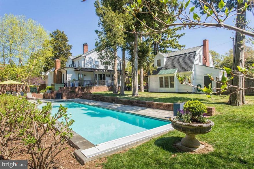 **Sale Includes Both: 1300 & 1300-A College Ave***Main House: 1300 College Ave: 3319 Finished Sq Ft (5 Bedroom/3.5 Bath/46' In-Ground Pool w/Retractable Cover/Off-Street Parking)*Carriage House: 1300-A College Ave-965 Finished Sq Ft (2 Private Units: 2 Bedroom/2 Bath/2 Kitchens)*Use as Either a Guest House or Two Separate Rental Units-Rent Up To $1K Per Unit*Impressive One-Of-A-Kind Treasure in Downtown Fredericksburg w/Private Pool, Detached Carriage House, Walking Distance to Everything the City has to Offer! This 1916 Dutch Colonial w/Slate Gambrel Roof & Clapboard Siding Offers;  5 Bedroom, 3.5 Bath and Sits on a Half-Acre Corner Lot w/ Tons of Privacy and a Flexible Floor Plan. You Will be Proud to Call 1300 College Ave Home & Your Family & Friends will Too! The Main House was Recently Renovated to Include Luxurious Bathrooms and a Gourmet Chef's Kitchen. The Home Maintains its Original Character w/ Crown Dentil Molding, Bulls Eye Corner Rosettes, Oak Hardwood Floors, Wood Burning Fireplaces, Parlor w/ Formal Living Room & Wood Burning Fireplace, Formal Dining Room, and Soaring Ceilings. The Six-Pane-Over-One Windows Allow an Abundance of Natural Light Throughout the Home. Just off the Formal Living Room Area is a Private Study & Powder Room. A Casual Entertaining Area was Added off the Kitchen which Leads Out to the Covered Brick Patio, Carriage House, and your Very Own Back Yard Oasis. There are Two Master Suites in the Home. The Main Level Master Suite is Complete w/ a Wood Burning Fireplace, Spa-Like Bath, Walk-In Closets, Hardwood Floors, Private Laundry, & Private Access to the Covered Brick Patio. The Kitchen Includes; Quartz Countertops, Glass Backsplash, Two-Tone Cabinetry, Commercial Range & Hood, an Additional Oven, Refrigerator & Dishwasher (Concealed w/Matching Cabinetry), Separate Ice Maker, Separate Bar Area w/Sink, and Bamboo Floors. The Upper Level of the Home Offers; the 2nd Master Suite w/Spa-Like Bath and Hardwood Floors, Along with 2 Addition Large Bedrooms, Another Fabulous Full Bath w/Glass Shower, and Plantation Shutters. The 3rd Level of the Home Offers a 5th Bedroom which Can also be Used as a Flex Space. The Unfinished Basement Offers a Second Laundry Area as well as Additional Storage. The Front of the Home Faces College Ave and has an Expansive Full Length Covered Porch with Columns, Standing-Seam Metal Roof, & Heavily  Landscaped. The Lush Fenced in Back Yard Offers; Private 46' In-Ground Pool, Paved Patio w/Built-In Gas Grill, and Tons of Privacy. The Carriage House Offers; Two Separate Living Quarters which Can be used as Rental Properties or a Guest House. The Lower Level of the Carriage House Has a Living Room, Full Kitchen, Eating Area, Bedroom, and Private Bath. The Upper Level of the Carriage House has a Large Open Space with a Kitchen and Full bath. In Addition to Permitted Parking the Home also Offers Private Off-Street Parking for Several Cars.This Home is a MUST SEE!!