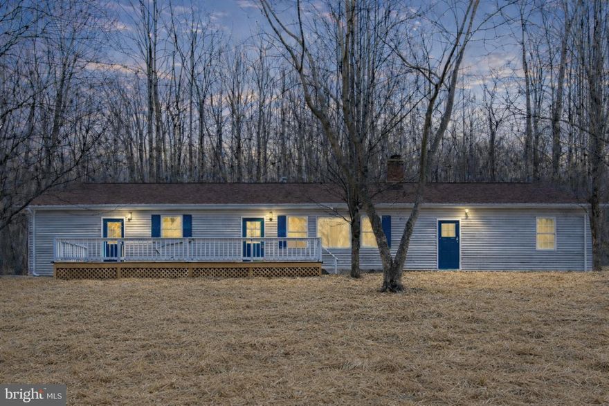 Escape the city and enjoy this beautifully updated 3-bedroom ranch home on 1.30 private acres, backing to the Shenandoah National Forest. Quiet, wooded setting with mature trees offering privacy and natural surroundings. One-level living with extra-wide doorways and large rooms throughout and attached garage.

Home features wood floors, a spacious living room with gas fireplace, and a large dining room with a newer wood stove that provides excellent supplemental heat. The updated kitchen offers new appliances, quartz countertops, large island, abundant cabinet space, new flooring, and updated lighting.

Primary bedroom includes new carpet, a large updated full bath, huge walk-in closet, and a private exterior door leading to a freshly painted deck. Second bedroom offers new carpet and large closet. Updated hall bath features double vanity and new flooring. Third bedroom includes a bonus room with separate entrance, ideal for an in-law suite orSpacious attached garage. New roof (2021) and HVAC approx. 7 years old. Located just down the street from the Northern Virginia 4-H Educational and Conference Center, offering public swimming and recreation, short drive to town for all your shopping and fine eateries historic Front Royal VA has to offer. Walking trails nearby for those morning walks.  Less than 3 miles to shopping and restaurants. Commuter lot only 2.5 miles away for those northern Virginia or DC commuters.

Excellent full-time residence, retirement home, or profitable Airbnb. Must see.