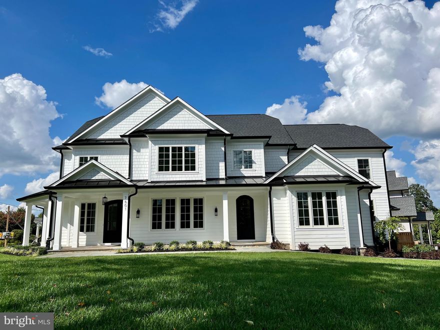 Construction is now complete! A stunning new home in one of Bethesda’s most coveted neighborhoods! This home offers over 7,000 square feet of living space sited on a 14,101 square foot lot. The unique floor plan includes a first floor bedroom suite situated away from the main living area and an elevator servicing all three levels … A rare find in Bethesda! The gracious home design features formal living and dining rooms, spacious family room with fireplace, kitchen with two large pantries plus a butler’s pantry and huge mudroom connecting the home to the two-car garage. The large kitchen offers high-end appliances to include SubZero refrigerator, Wolf eight-burner stove with custom vent hood and dual dishwashers. It also includes custom cabinetry, center island with seating and two sinks (one on the island). A large table space has built-in benches. This house is built for entertaining! The kitchen opens to the family room, creating a wide open space with loads of natural light. With both a screened porch and a deck off the family room, it’s easy to take the party outside! Architectural details and custom built-ins throughout the home elevate the home’s style. The upper level is designed around a center hall, providing additional privacy for the grand primary suite. A second floor family room with built-ins is the ideal spot for watching tv or a home office. The primary suite includes two closets with custom built-ins and a spa-like bath. Three additional bedrooms on the upper level each include en suite baths and generous closet space. Laundry is also located on the upper level. The lower level includes large windows around the perimeter of the recreation room, soaking the space in natural light. This is another great space for entertaining a crowd, with a wet bar and a wide open room wired for entertainment. The lower level also features an exercise room, bedroom with full bath and plenty of storage. Sited on a corner lot, this home has a side load garage which allows for a beautiful front facade, free of concrete driveway and garage doors.