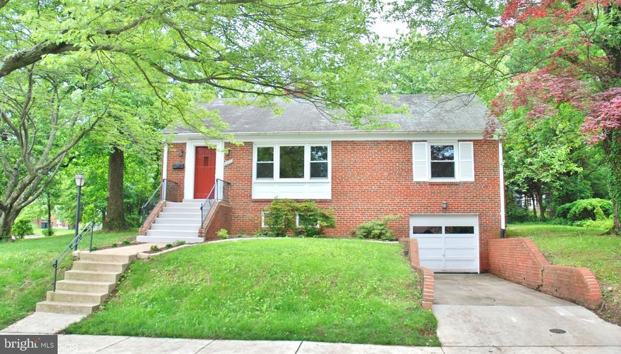 This immaculate abode is just  seconds from MD U. !  It boasts a FP & gleam. hard wood floors on main level. Kit has SS appliances w/ butcher block counter tops. Also has all new windows & new hot water heater., enclosed porch & rear Dk. Master. bath. w/ heated floors & Jacuzzi Tub w/ base lighting. 2 rooms upstairs has sky light windows. 6th BR, w/FP  on lower Lv. & 1 car garage  w/ new opener.