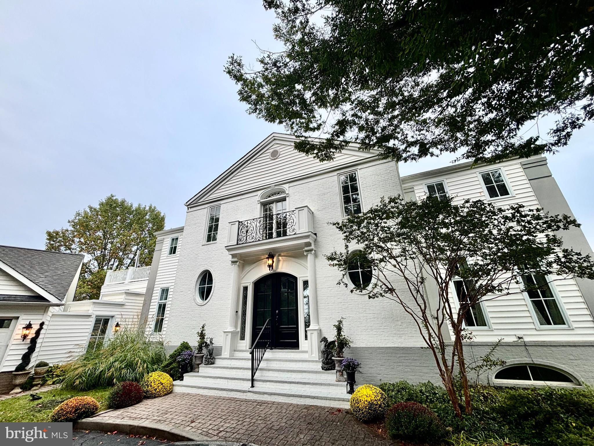 Custom built estate home offering 6300+ sq feet of incomparable elegance in a location unmatched in the area. The views from almost every room are beyond stunning - rolling hills, sweeping water+stream views, even a covered bridge- adjoining Frederick's only Private Country Club-Holly Hills! A home like this comes around once in a lifetime where it's renovation left no detail overlooked - and has even been featured in commercials and film! The residence boasts the finest appointments in millwork and materials simply not found in today's market. Teams of highly skilled artisan craftsmen were brought in to create a showplace that is more than just a home, it is a work of art. Step though the massive double Mahogany and beveled glass arched entry doors flanked by leaded glass into a large foyer w. an 11ft+ tray ceiling, exquisite inlaid marble floors and an impressive arched gallery hall traversing the axis of the home-arched portals framing grand barrel vaulted entries to a 2 story Great Hall w. monumental Palladian windows, gorgeous Schonbek lighting w. a mechanised chandelier lift. The banquet scaled formal Dining Room boasts more feature millwork and a multi-tier antebellum era crystal chandelier. Off this wing of the home is the 3 car garage vestibule, side porch w. 8 person Hot Tub, and Butler's pantry. The gourmet Kitchen of the home boasts custom high-end solid wood cabinetry, GE Cafe, Thermador, and Subzero appliances, quartz countertops w. a custom tile backsplash- Pocket doors in an archway lead to the Great Hall for ease of separating the Kitchen during catered events. A stunning grand stairway features custom made wrought iron railing, multiple landings, monumental scaled fluted pilasters, corinthian capitals, built-in antique mirrors flank 2 walls, and a domed ceiling w. chandelier lift. The South end of the home features a lovely parlor w. 3 walls of windows, custom European wooden pelmets, a gas fireplace w. stone figural mantle, built-in bookcases with glass shelving, + large open symmetrical arches to both the Great Hall and the Gallery, and custom lighting from Schonbek. The walk-out Terrace Level features French Oak style porcelain tile flooring, sliding doors to a massive paver patio, a Lounge w. a gas fireplace with a museum-grade limestone figural mantel. There is a bedroom w. double exposures, berber carpeting, a utility+storage room and an amazing in-law suite w. a SECOND kitchen, separate laundry room, custom cabinetry, quartz countertops +backsplash, +breakfast bar, living room area, a large Den, a full bathroom w. dual sink vanity, a very large bedroom w. two sets of dual closets + more fantastic views. The Upper level hosts an magnificent arched axis gallery overlooking the Great Hall where you will find 4 bedrooms and 3 full baths which include the spectacular Primary Suite on its own wing accessed through double doors to an oval vestibule w. tray ceiling leading to a tower bedroom w. coffered ceiling + almost 360 degree views. The suite offers a large custom W.I.C. and a REAL spa bath w. multi jetted steam room shower, custom inlaid marble mosaic, chromatherapy lighting, integrated sound system, dual sink vanity w. floating LED mirrors, W.C., Jacuzzi alcove w. hand painted LED star ceiling, and custom gothic tracery +lighting. A private roof deck boasts a firepit and spectacular valley, water, golf course and mountain views. This home has effortlessly hosted grand private events for hundreds and has THE premier front-row seat for all of the fireworks displays for the country club AND Lake Linganore to the North!
Other notable features outside of a complete structural remodel completed in the past 2 years are a new architectural shingle roof, Marvin and Pella windows and 8ft doors, New 3 zone high efficiency HVAC, Tankless HWH, Hardwood and marble floors, multiple fireplaces, whole house insulation, + SO much more. There is simply nothing like it- Welcome to the Villa! Agent/Owner.