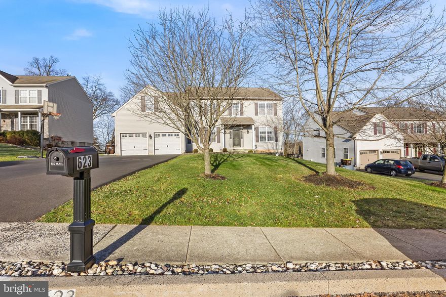 Welcome to this exceptional 5 bedroom, 3.5 bath Colonial that has been beautifully and thoughtfully updated, and is sure to impress. Upon entering, a grand two-story foyer sets the tone with a bright and open design, creating an inviting atmosphere throughout. The first-floor offers an office with glass panel French doors, a dining room with a board-and-batten feature wall, and a large 46 handle eat-in kitchen. This tastefully updated kitchen boasts a center island with seating, granite countertops, a pantry and stainless steel appliances including a 6-burner gas range for the culinary enthusiast in you. A sliding glass door leads out to the spacious second-story deck, complete with a charming pergola, providing picturesque views of the surrounding trees. The kitchen flows seamlessly into the great room, which is bathed in natural light from a wall of windows and features a cozy gas fireplace, making it the perfect place to unwind. Also on this floor, you'll find a versatile bedroom that could be used as a second home office, a laundry room and mudroom with lots of cabinets to keep you organized, and there is an updated half bath for guests. Ascend the staircase from either the foyer or the kitchen to discover a spacious and ideally laid-out second floor. Down the catwalk and through the French doors, the primary suite features a vaulted ceiling, two walk-in closets and a beautifully updated ensuite with a custom vanity. Three more nicely sized bedrooms, two of which are fitted with closets by "Closets by Design”, as well as two additional full and updated bathrooms ensure that there is plenty of space for family and guests. The fully finished walkout basement offers options with ample room for a theater room, a game room, and an exercise room, making it a versatile space for all your entertainment needs. The dry bar with a mini-fridge adds a touch of convenience, and the glass paneled door leading out to the fenced-in backyard creates a seamless indoor-outdoor flow for gatherings. An attached two-car garage and an expanded driveway ensures plenty of parking for you and your guests. There are many updates and upgrades in this exceptional home including a reverse osmosis water filtration system. Conveniently located, this home is close to shopping, restaurants, and offers easy highway access -- all within the highly-rated Perkiomen Valley School District, making it an ideal choice for your forever home!