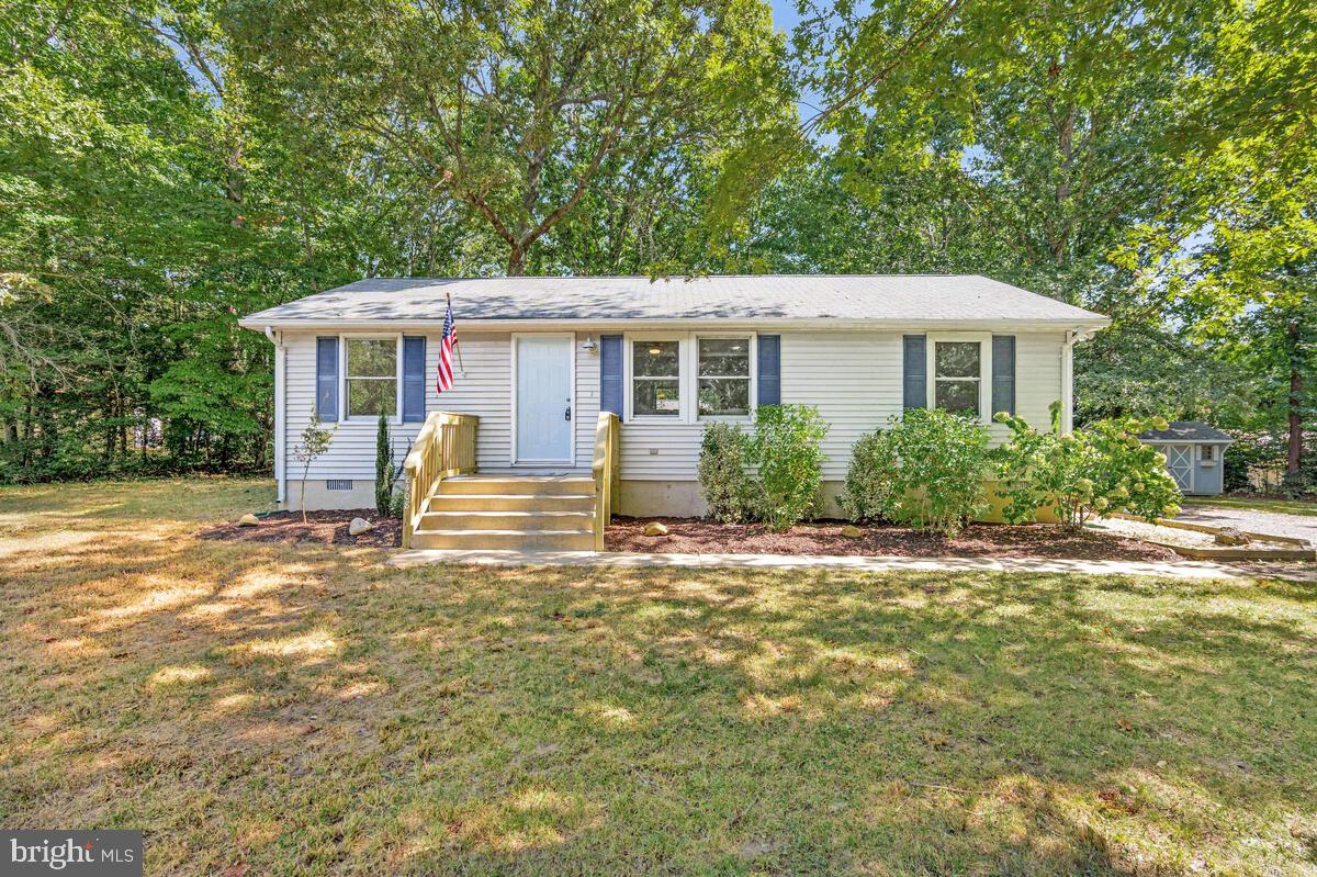 Thoughtfully updated and desirable Turn Key home.. This 3 BR 1 BA property is sure to delight with its Open Floorplan and 1 level living. From the start you will note the quick access to Rt 4, as this home is conveniently located at the front of the community on a peacefully quiet street. You'll immediately be drawn to the large level lot, the fresh landscaping and the sense of space between neighbors. There's a welcoming oversized front porch which teases the warmth of this home. You'll for sure enjoy the easy care of no carpet living, fresh professionally painted rooms throughout , and an updated kitchen w/new select stainless appliances and new countertop. The largest bedroom, features 2 closets, including a walk in. Hmm... perhaps room for instant equity by turning into a 2nd bathroom?? 2 additional bedrooms make room for all. Home includes an attractive outdoor living space with a spacious refurbished deck which overlooks a private, partially fenced backyard. A shed is provided for storing all your outdoor lawn and garden equipment. Practical percs include a newer roof, recently inspected and pumped septic and a no fail UV light for your private well. Start enjoying the conveniences of this sweet Southern Maryland home right away. Close to waterfront restaurants, shopping and all that the PAX/DOD Corridor offers.