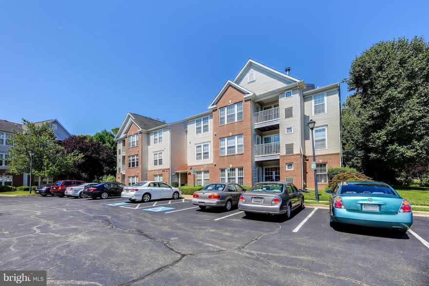 Stunning Ground Lvl Condo w/ Open Concept Layout, Custom Paint & Hardwood floors thru-out. Kitchen w/ pass-thru & brkfst bar, Granite Counters, Stainless appliances, Pantry & Lrg Storage Closet. Owners Ste incl. W.I.C. 2nd Bedroom w/ Dual Entry Full Bath, Washer/dryer in unit. Lots of unassigned parking & entry frm ground level patio. Water incl. in condo fee. Great for commuters! FHA/VA approved!
