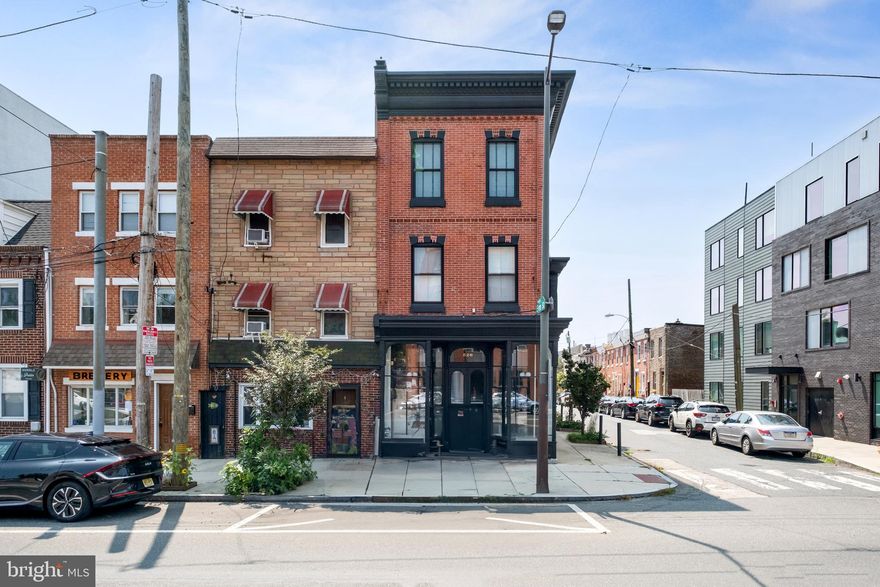 One of a kind!!

Welcome to this one of a kind Fishtown Victorian, a true gem that exudes charm and history! This lovingly restored property offers 3,300 sq ft of living space, including an attached two-room storefront for those seeking a work-from-home lifestyle. With its rich character and many original details, this home is a testament to timeless craftsmanship.
Originally built as a candy shop, ice cream parlor, and family home, this building has only had four owners, with the current owners undertaking extensive period-appropriate renovations and careful restorations in 2016. Modern comforts are seamlessly integrated, featuring a renovated kitchen and 2 baths, refinished original hardwood  floors, central air, radiator heat, zoned security alarms, a commercial-grade fire alarm, and an electric parking gate. The first floor impresses with approx 550 sq ft storefront, boasting original display windows and front door, hardwood floors, stunning custom pocket doors and original light fixtures. Easily, this room can be used as a formal living room or a commercial/office space. The next room is currently used as a formal dining room showcases all original woodwork, giant windows, hardwood floors, crown molding, and an exquisite sweeping staircase. The kitchen, renovated in 2016, is a chef's dream with quartz countertops, a large eat-in island, stainless sink, and appliances. Butler stairs lead to the second floor, while a mudroom off the kitchen offers a utility sink, vintage tile floor, and a full bath with a stall shower, granting access to the private backyard and gated parking. Ascending the grand staircase to the 2nd fl, you'll discover two bedrooms and a bathroom with original raised-tank toilet, vintage tile floor, pedestal sink, claw-foot bathtub, and a charming stained-glass window. The large front rooms, bathed in natural light, serve as living and family rooms w/ sunny bay window, 9.5-foot ceilings, vintage chandelier, and original pocket doors. The lovely long hallways on both the second and third floors are adorned with elegant milk glass light fixtures. The third floor is a haven with four sunny bedrooms, including one with new carpet and a Juliet balcony, and another currently used as a dressing room. The renovated  full bath offers a new vanity, vintage floor tile, and a delightful claw-foot tub with a shower. The spacious primary bedroom has sound-dampening windows for serene relaxation. The basement, previously utilized by candymakers, features tiled floors and is semi-finished, housing the washer and dryer. Bilco doors provide easy access to the sidewalk on Eyre Street, and a unique trap door in the ceiling connects to the storefront, adding to the property's allure and charm. The yard and exterior have received thoughtful upgrades, with the entire house receiving new exterior paint in 2020, along with new 1st-floor windows and storefront storm windows. The backyard was nicely re-done, providing al fresco dining area, built-in planter, grass pad, and parking space. A fence was installed in 2016, ensuring privacy and security. Adding to its appeal, the property received a new roof in 2022. The location is unbeatable, as Fishtown is one of the hottest neighborhoods in Philadelphiat, offering parks, award-winning restaurants, and bars. A library, free public pool, and recreation center with a playground are just a block away, while Adair elementary school is conveniently three blocks away. Girard Avenue's easy access to I-95 makes commuting to NYC a breeze.  Situated on two lots, the main building and storefront grace 526 E Girard, while the backyard/parking are located at 1131 E Eyre Street, both w/ CMX2 zoning and separate tax id #'s. Please note the parking is deeded and is permit ready. 1131 E Eyre . Has Limited Lodging Permit.