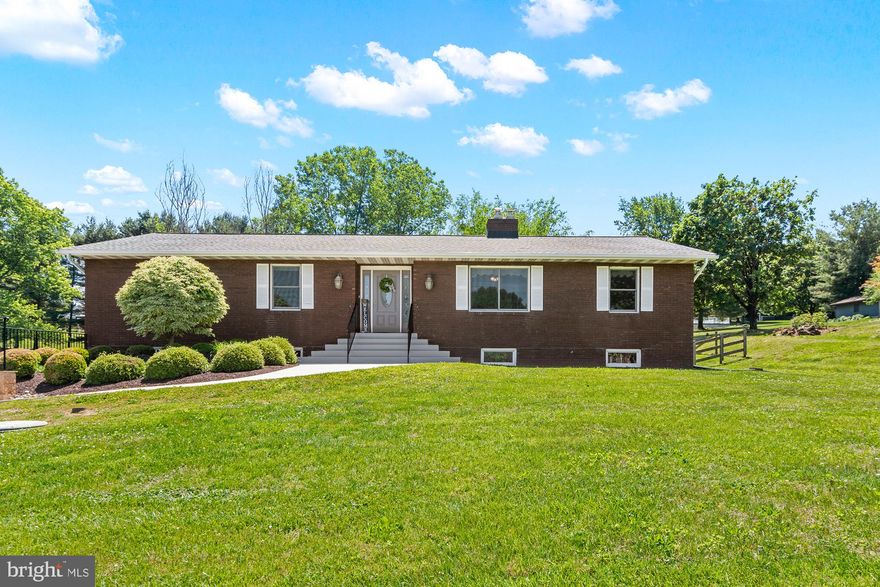 This charming ranch-style home, built in 1976, exudes warmth and comfort, making it the perfect retreat. With 1,972 square feet of thoughtfully designed living space, this residence features three spacious bedrooms and two full bathrooms, ensuring ample room for relaxation and privacy. Step inside to discover a traditional floor plan that seamlessly connects the formal dining area to the inviting living spaces. The cozy wood-burning fireplace serves as a focal point, perfect for gathering on chilly evenings. The upgraded countertops in the kitchen complement the stainless steel appliances, including a built-in microwave, dishwasher, and electric oven/range, making meal preparation a delight. The home boasts a mix of flooring, including plush carpet and elegant hardwood, enhancing its inviting atmosphere. The unfinished basement offers endless possibilities, whether you envision a recreation room or additional living space. Outside, enjoy the expansive deck, ideal for entertaining or simply soaking in the tranquility of your surroundings. The attached oversized garage and ample driveway parking ensure convenience for you and your guests. With its excellent condition and thoughtful features, this home is ready to embrace new memories. Experience the perfect blend of comfort and functionality in a space that truly feels like home. Updates made to this home by the current owner: In 2017 all new Anderson windows, front door, insulation (attic, basement, over garage). In 2018 the retaining walls were replace and new landscaping was installed, new roof and gutters, well pump and water treatment system. 2019 brought a full kitchen renovation, 2021 new garage doors and finally in 2022 a new wood stove!! This home fees far away but is close to everything.