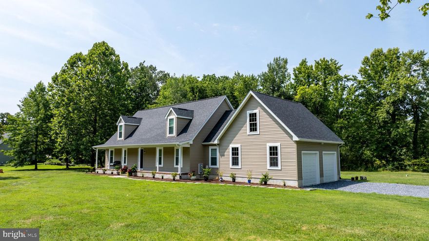 Built in 2019, this well-maintained 4-bedroom, 3-bathroom Cape Cod situated on a 1+/- acre lot is waiting for you. As you arrive, the inviting covered front porch welcomes you into the home. Inside, you'll discover an open floor plan on the main level, seamlessly connecting the living, dining, and kitchen areas. The main floor also features 2 bedrooms, including the primary suite complete with 2 closets and a bath. The kitchen boasts stainless steel appliances, beautiful granite countertops, and a spacious island with seating for 4, perfect for casual dining and entertaining guests. On the 2nd floor, you'll find 2 additional bedrooms and a full bath, as well as the expansive unfinished attic space with spray foam insulation. This space presents endless possibilities for customization, whether it be as a recreational area, home office, or additional storage. Beyond its aesthetic appeal, this home offers additional conveniences such as an attached 2-car garage, a UV light on the HVAC system, an encapsulated crawlspace, and gutter guards providing added peace of mind and ease of maintenance. This summer, the exterior received lots of new upgrades including re-grading of the front and back yards, and a new walkway in the front yard creating freshly planted and mulched flowerbeds that lead to the covered front porch. The backyard also has a new walkway leading to the newly built deck protected with Nano+Poly seal. More upgrades include fresh stone in the driveway and a downspout drainage system that carries water away from the house underground.