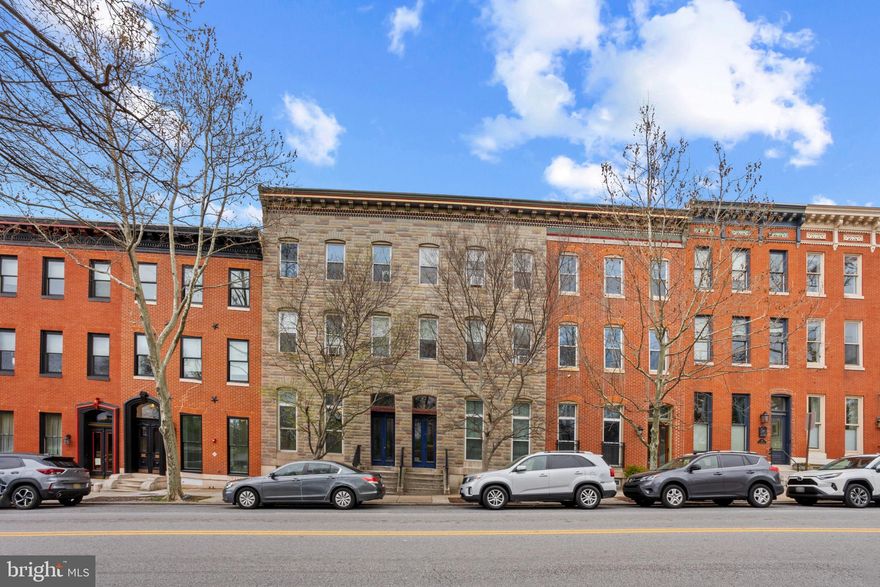 Renovated 3 BR, 3 BA unit in Butchers Hill.  
Apartment has two primary suites, one with an office area. Third BR has an adjacent BA. Large living room with adjacent side balcony, spacious newly-renovated kitchen w/island, new appliances, washer/dryer, large walk-out balcony in rear. Space located on the first level.

Utilities (Gas, electric, water )--fixed monthly additional payment of $250.