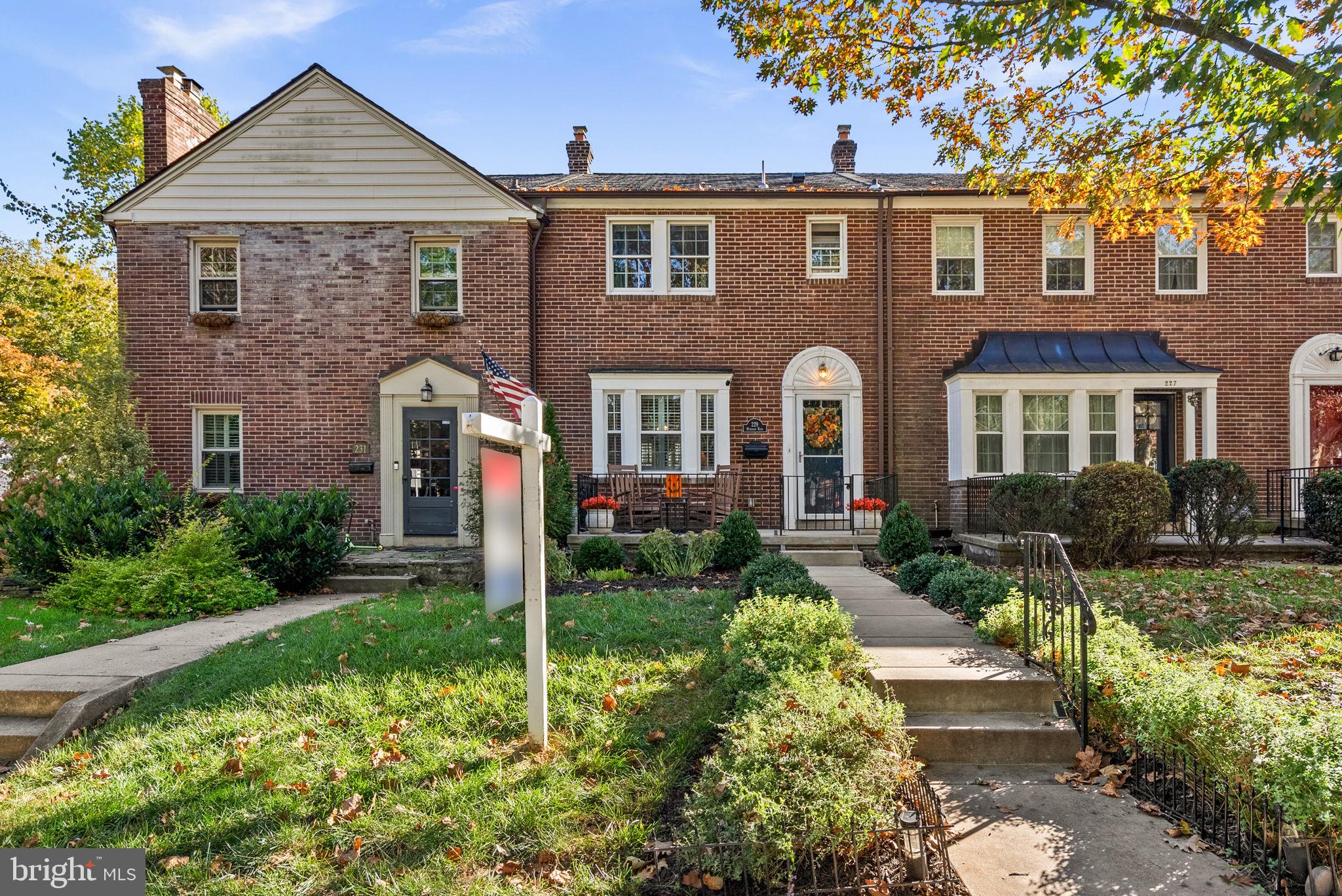 A Rodgers Forge Gem -- Blue Ribbon School District -- Exceptional Rear Yard -- Gorgeous Inside & Out! Welcome to 229 Murdock Road; Discover timeless charm blended with modern luxury in this beautifully updated brick townhome located on one of the most desirable blocks in Rodgers Forge. Featuring high ceilings, original architectural character, curved archways, elegant wood floors, and a layout full of natural light, this home has been thoughtfully improved inside and out. Step into a stylish and freshly updated interior with major 2024–2025 renovations, including: Complete spa-quality bathroom remodel (2024) w/ custom cabinetry, walk-in glass shower, luxury fixtures and hardware -- Upgraded mechanical systems & appliances (2024) including a new electric panel, electric vehicle charging station in the garage, new HVAC system, newly insulated attic, whole-house water filtration system, new kitchen appliances (2025) -- Exterior improvements (2021 - 2024) including a bluestone patio (2021), new wood privacy fence (2022), fresh sod in backyard (2025). Additional highlights include a professionally built custom storage closet (2024) -- double hung replacement windows -- professional window coverings & interior shutters -- ceiling fans -- wood floors -- curved walls and archways -- original hardware on doors -- custom millwork on handrails and chair railing -- granite counters & stainless steel appliances -- updated fixtures -- new basement door (2023) -- Anderson storm door -- Kwikset digital locks -- and the detached garage with the rare full parking pad large enough for an SUV — a standout feature in this neighborhood! Relax on the charming front porch or entertain in the private rear yard with patio, perfect for gatherings, grilling, or gardening. The lower level offers bonus living space, storage, or potential to finish as a home office or recreation room. Rodgers Forge has a stellar reputation in the region thanks to its charming historic row houses, tree-lined streets, and tight-knit community feel that evokes classic neighborhood pride. With top-rated public schools, walkable amenities, and a strong tradition of community involvement, it consistently ranks as one of the most desirable places to live in the Baltimore area. Virtual staging was used in several images.